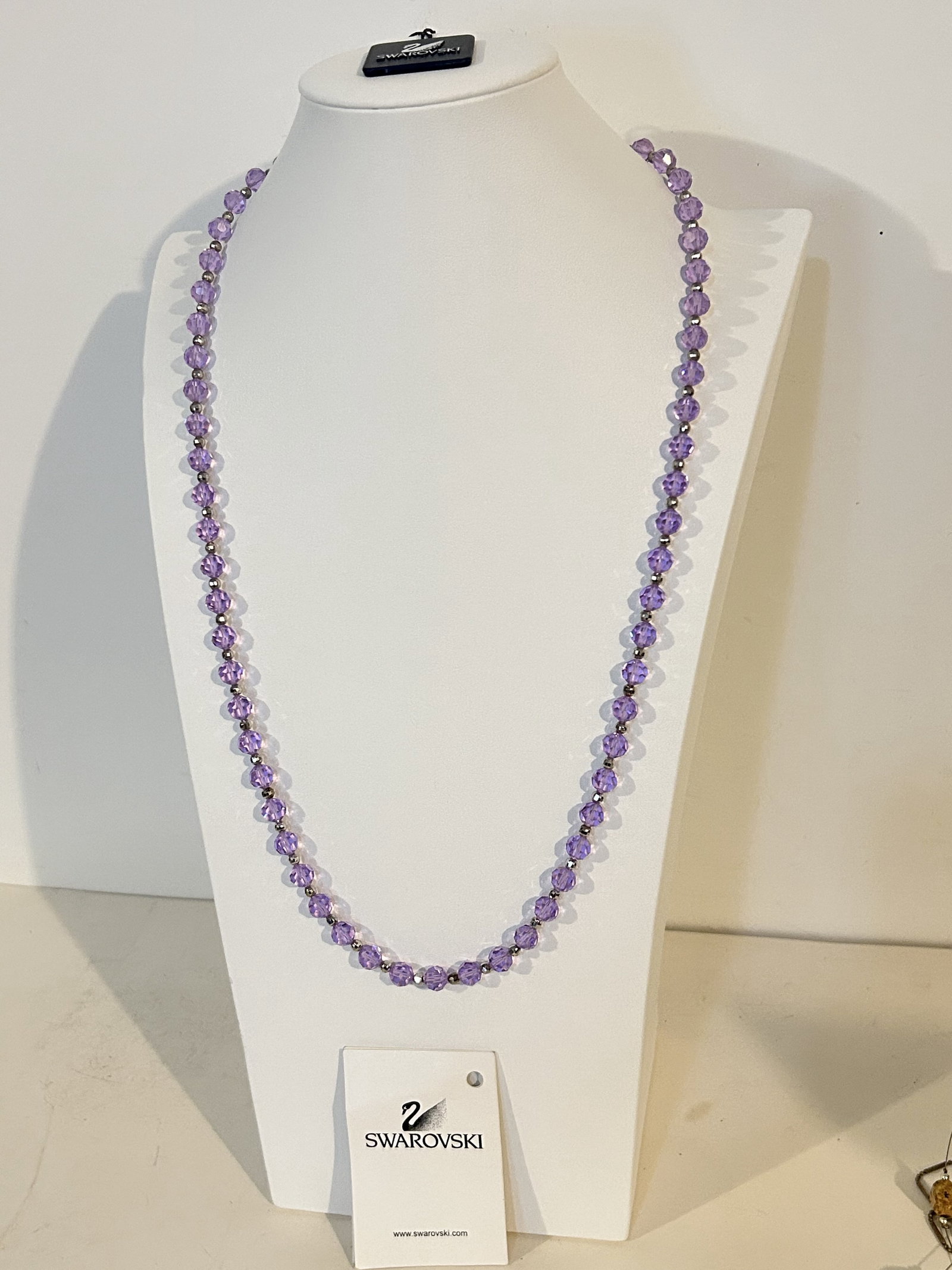 Authentic Swarovski purple crystal Necklace 30": Authentic Swarovski purple crystal Necklace 30" Please view all photos as they are part of the description and condition of this Item, Feel free to contact me with questions or picture requests! Used 
