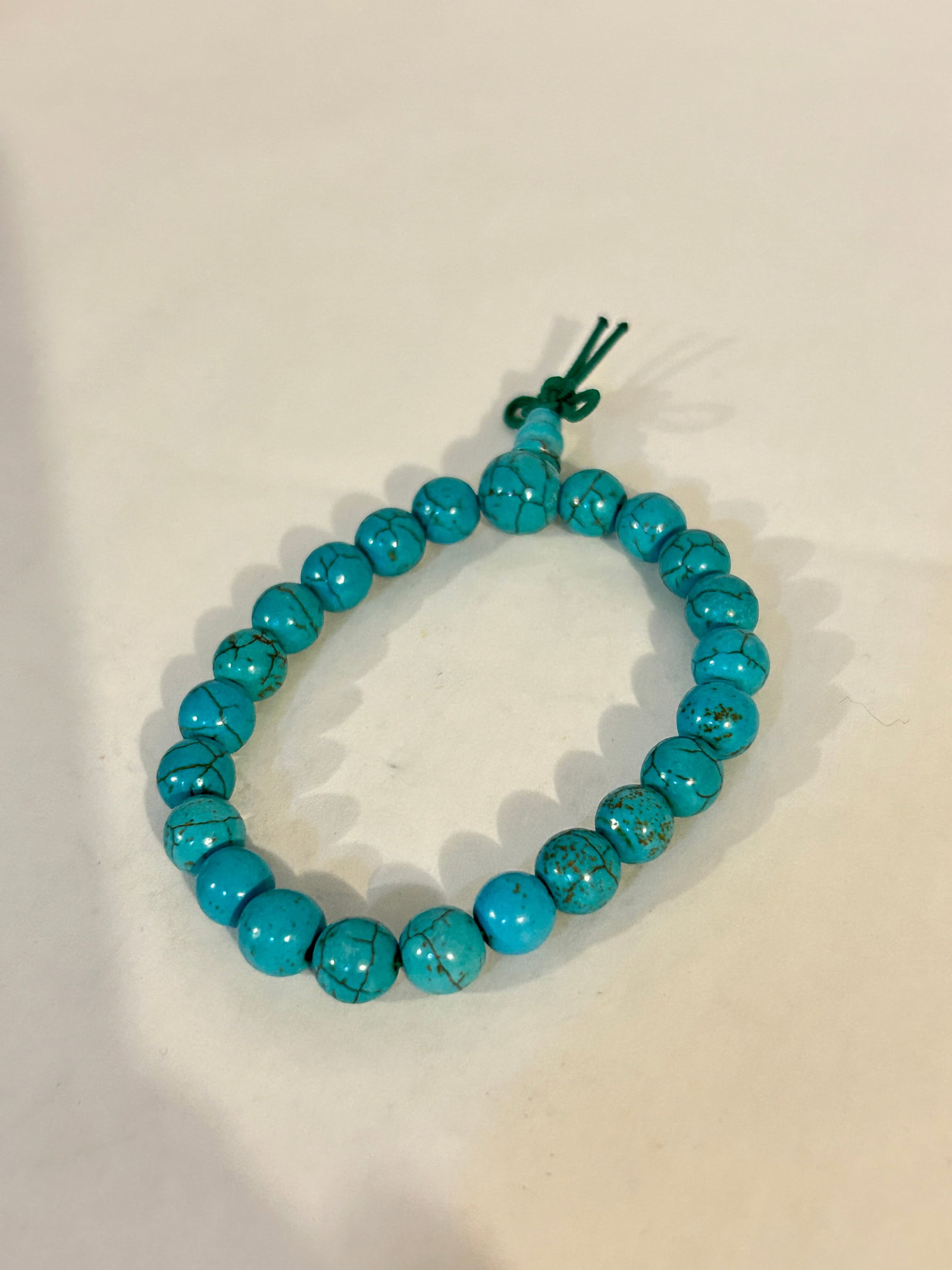 Vintage beaded stretch Turquoise Bracelet: Vintage beaded stretch Turquoise Bracelet Please view all photos as they are part of the description and condition of this Item, Feel free to contact me with questions or picture requests! Used Item A