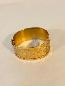 Vintage gold tone hinged Bracelet has inscription inside Sz 7