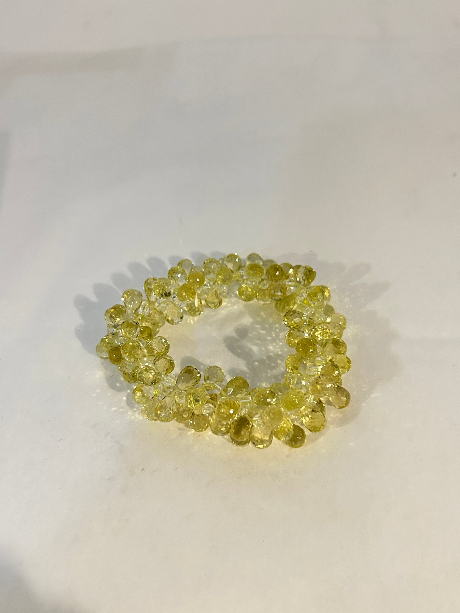 Vintage yellow gem stone stretch Bracelet: Vintage yellow gem stone stretch Bracelet Please view all photos as they are part of the description and condition of this Item, Feel free to contact me with questions or picture requests! Used Item A