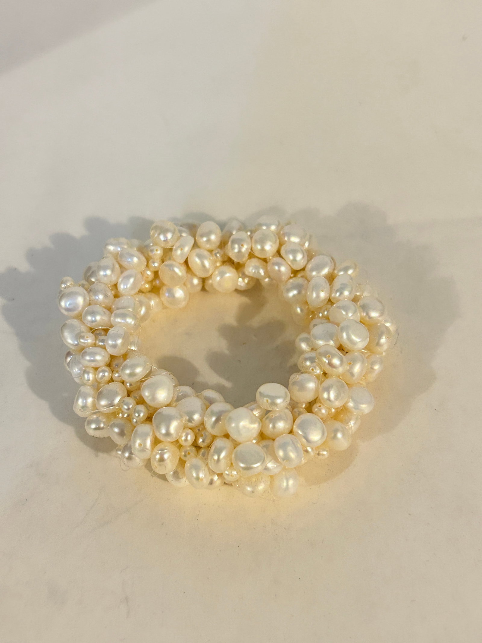 Vintage stretch pearl beaded Bracelet: Vintage stretch pearl beaded Bracelet Please view all photos as they are part of the description and condition of this Item, Feel free to contact me with questions or picture requests! Used Item AS IS