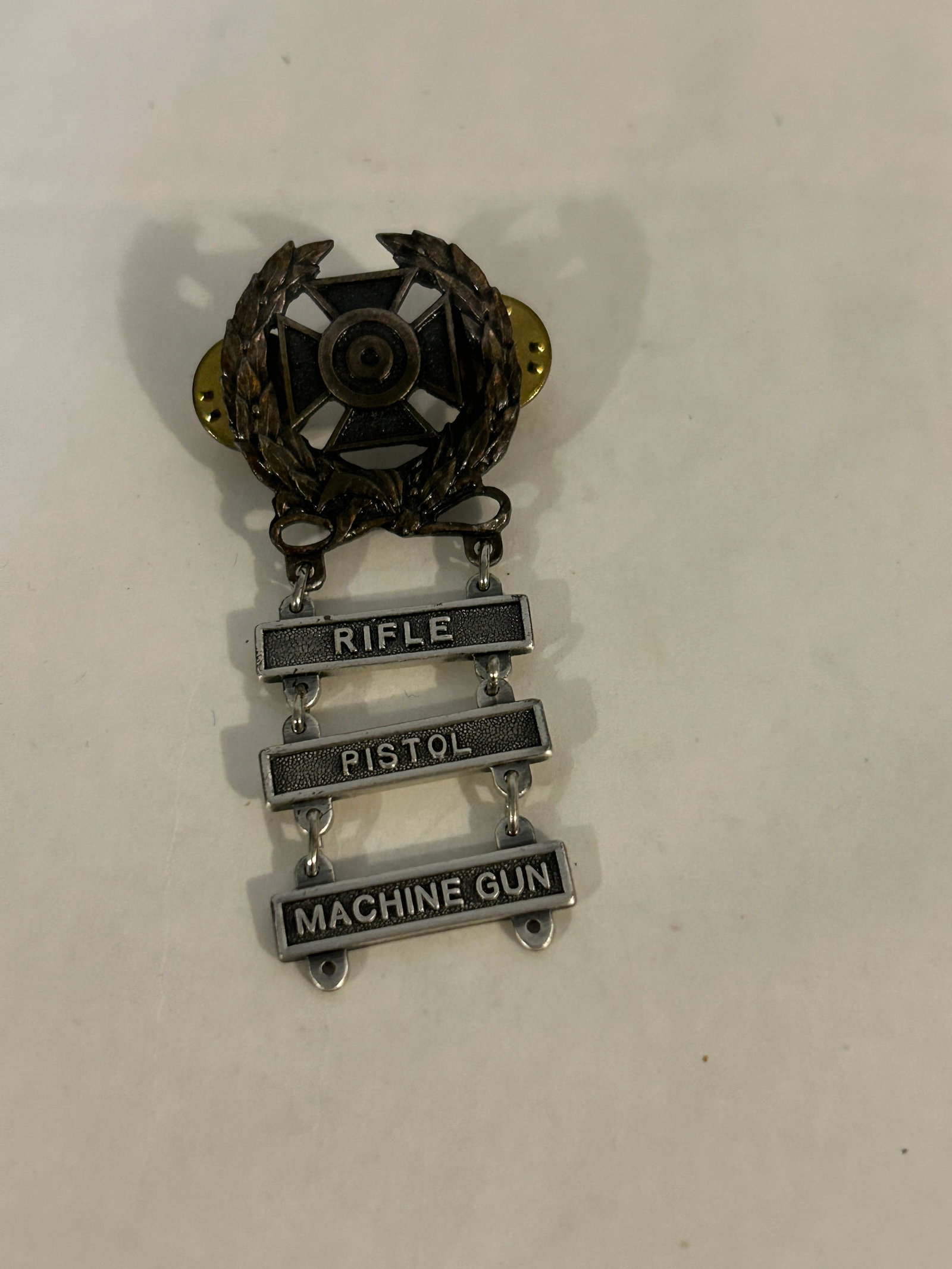Vintage WW2 Rifle Pistol Machine Gun US Army Badge Brooch Pin: Vintage WW2 Rifle Pistol Machine Gun US Army Badge Brooch Pin Please view all photos as they are part of the description and condition of this Item, Feel free to contact me with questions or picture r