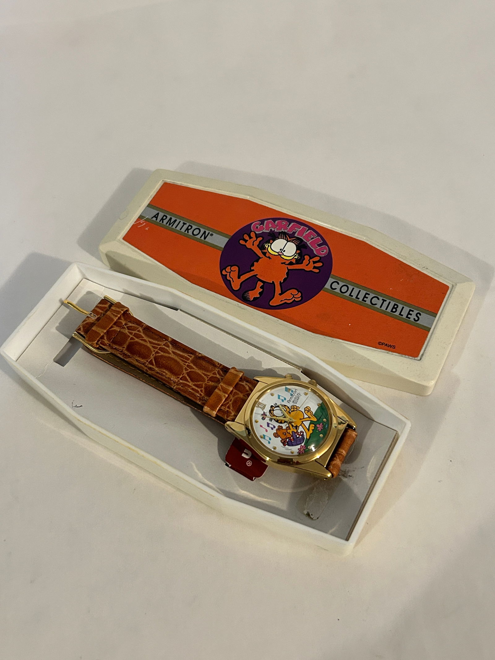 Vintage Armitron Garfield Musical Watch brand new: Vintage Armitron Garfield Musical Watch brand new Please view all photos as they are part of the description and condition of this Item, Feel free to contact me with questions or picture requests! Use