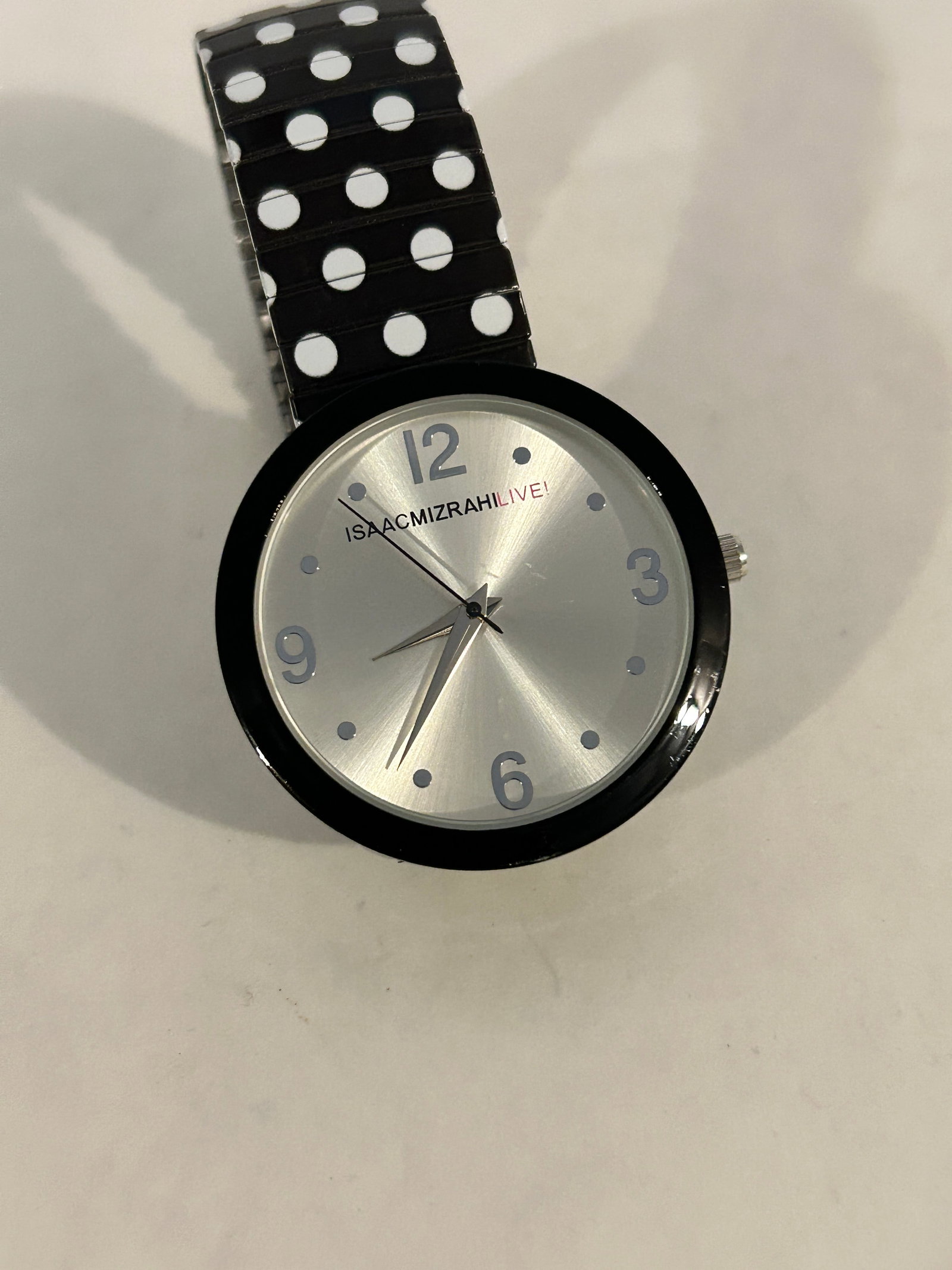 Isaac Mizrahi Live Watch 36mm black & white working: Isaac Mizrahi Live Watch 36mm black & white working Please view all photos as they are part of the description and condition of this Item, Feel free to contact me with questions or picture requests! U