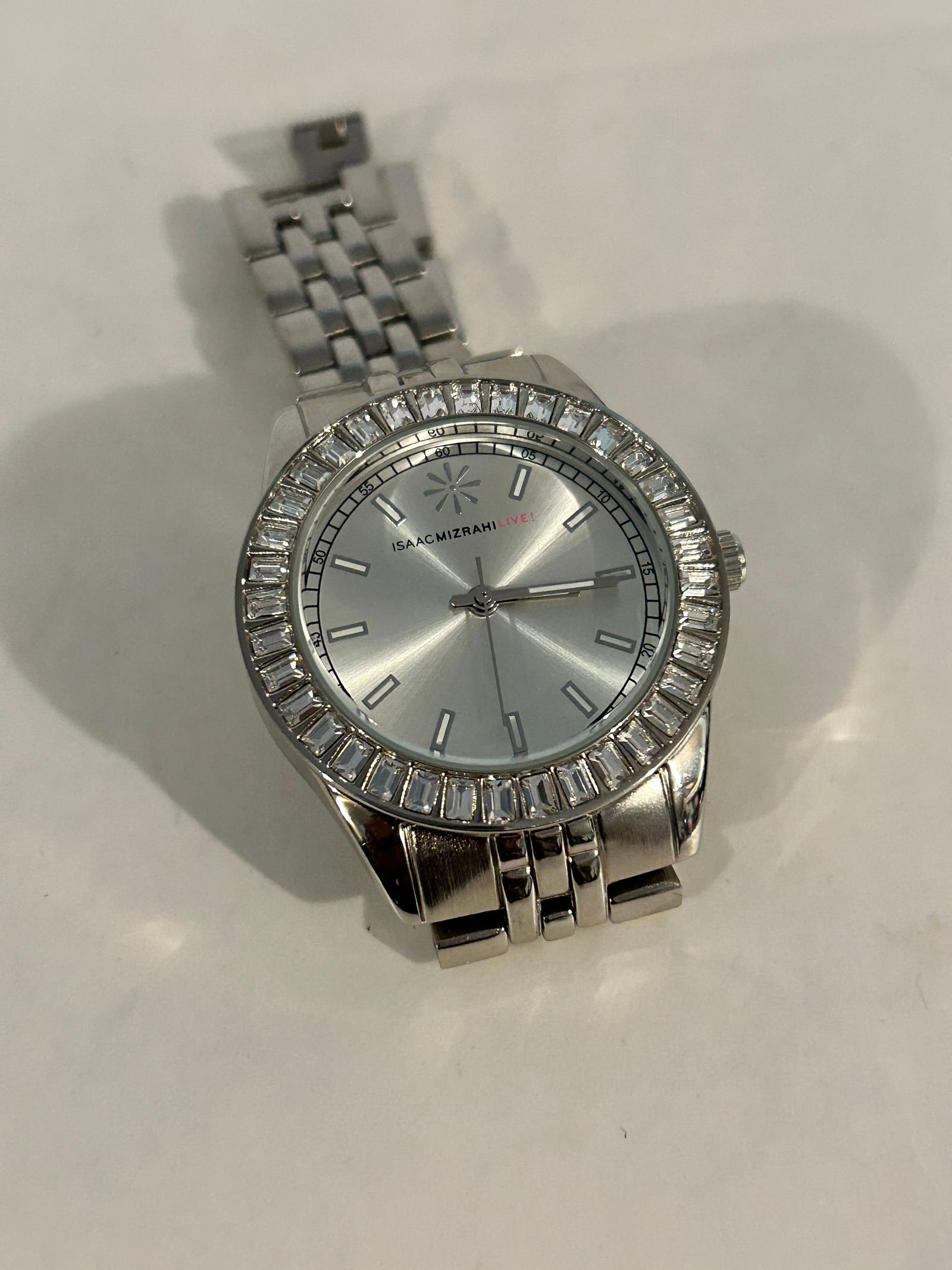 Isaac Mizrahi Live Watch 36mm Working: Isaac Mizrahi Live Watch 36mm Working Please view all photos as they are part of the description and condition of this Item, Feel free to contact me with questions or picture requests! Used Item AS IS
