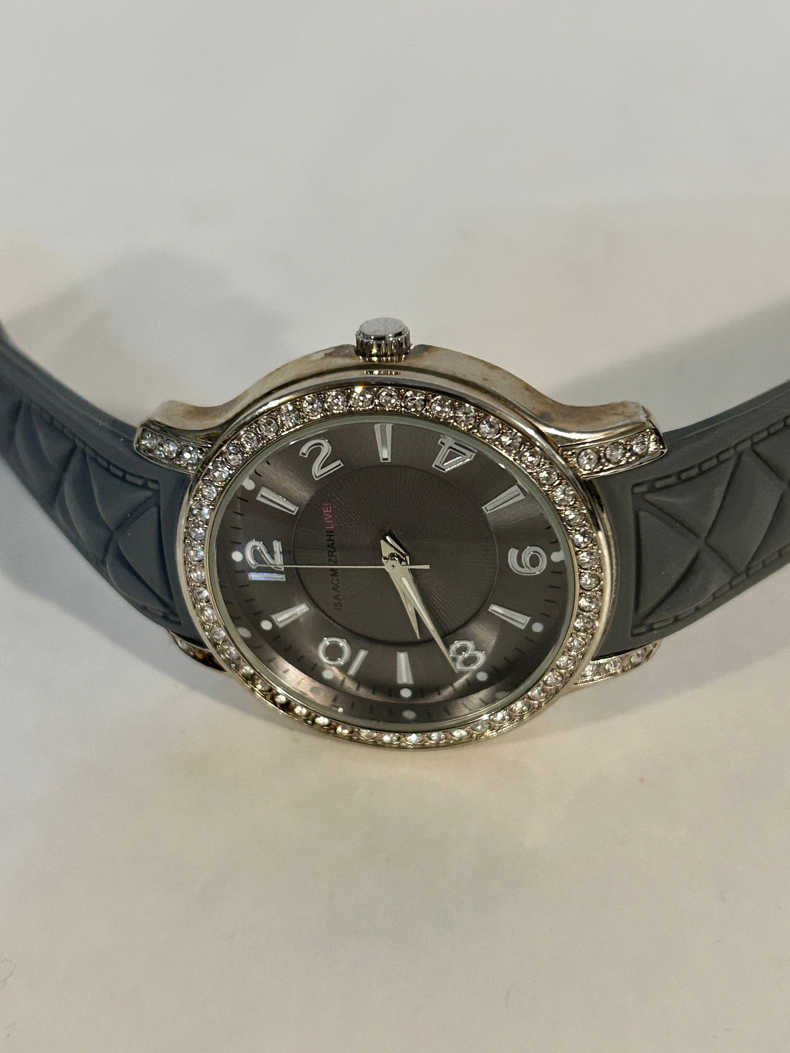 Isaac Mizrahi Live Watch 36mm Grey Working: Isaac Mizrahi Live Watch 36mm Grey Working Please view all photos as they are part of the description and condition of this Item, Feel free to contact me with questions or picture requests! Used Item