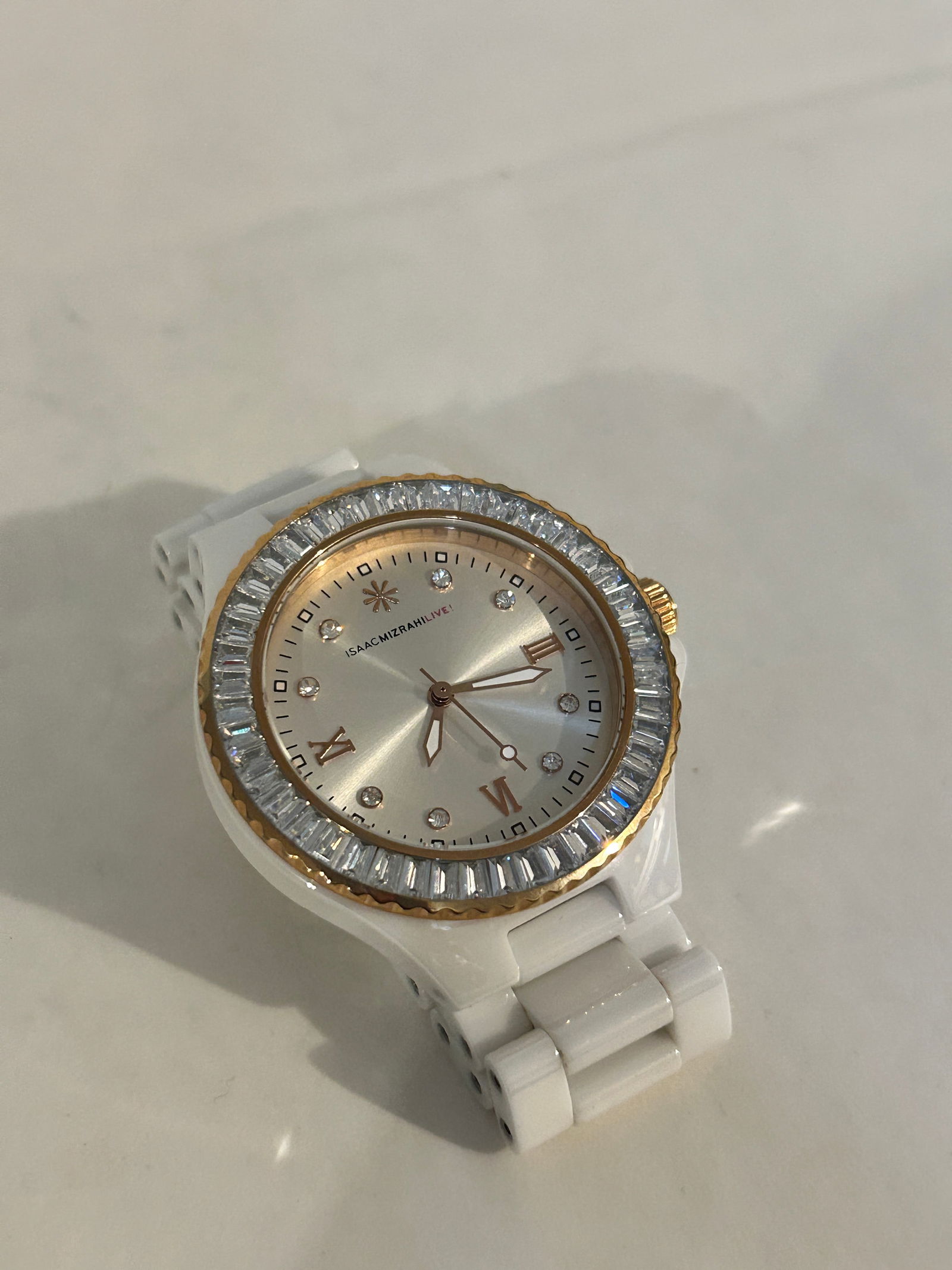 Isaac Mizrahi Live white Watch 36mm Working: Isaac Mizrahi Live white Watch 36mm Working Please view all photos as they are part of the description and condition of this Item, Feel free to contact me with questions or picture requests! Used Item