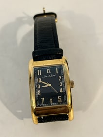 Vintage Jos. A Bank working quartz gold tone Watch