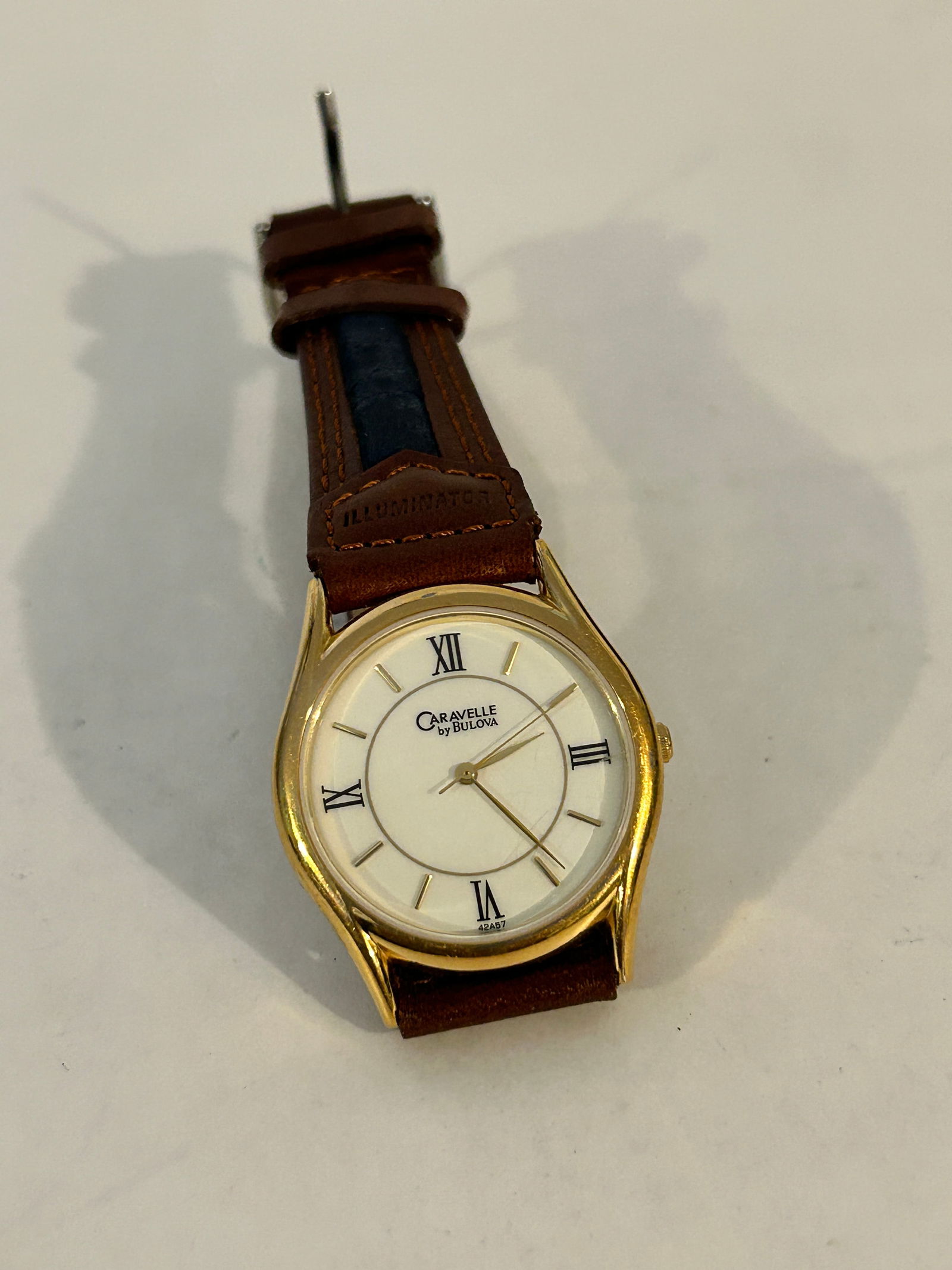 Vintage Caravelle by Bulova working quartz 42A57 Watch: Vintage Caravelle by Bulova working quartz 42A57 Watch Please view all photos as they are part of the description and condition of this Item, Feel free to contact me with questions or picture requests