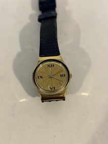 Vintage gold tone swatch quartz working Watch