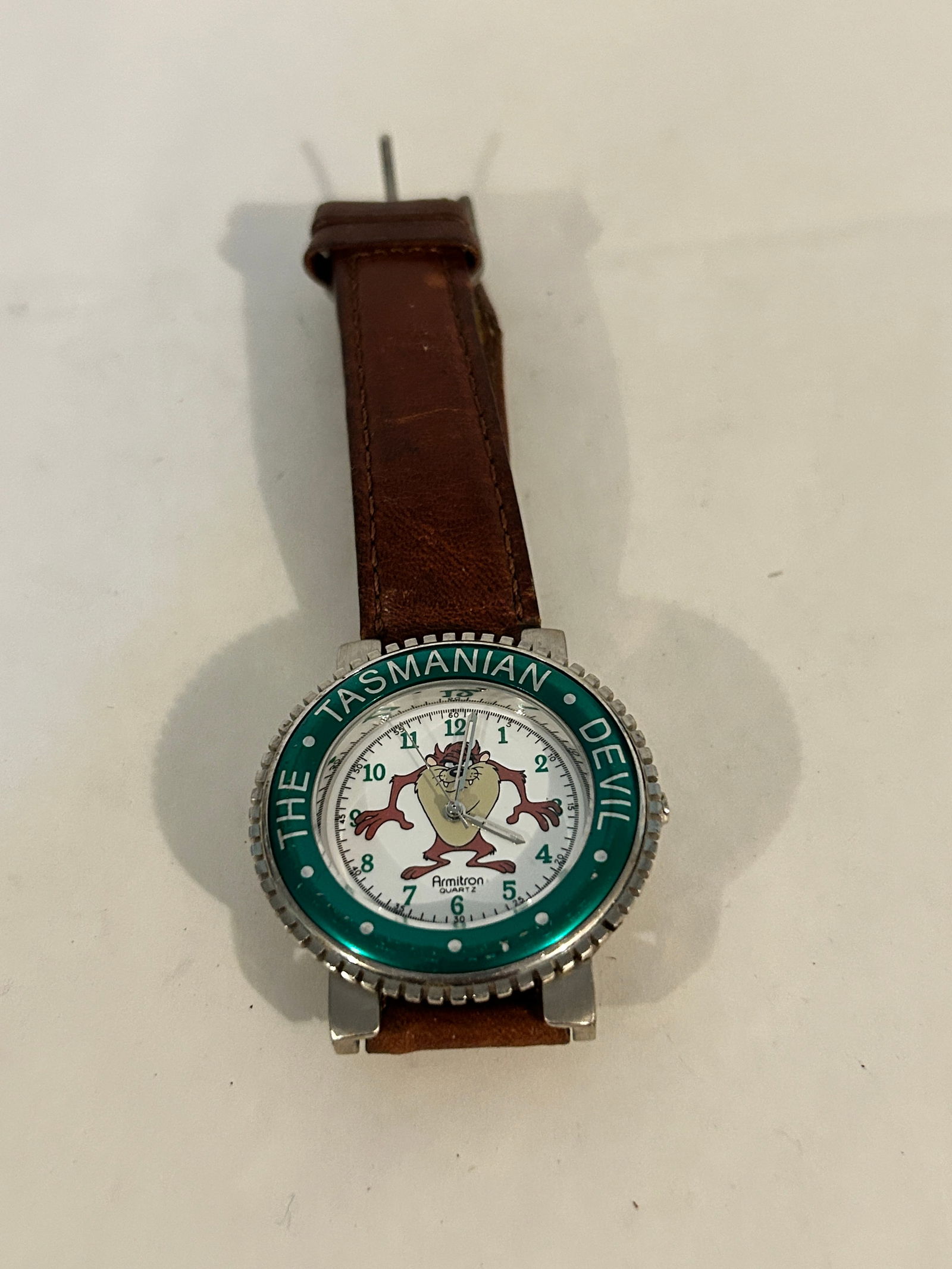Vintage Armitron Taz Manian Devil working Watch: Vintage Armitron Taz Manian Devil working Watch Please view all photos as they are part of the description and condition of this Item, Feel free to contact me with questions or picture requests! Used