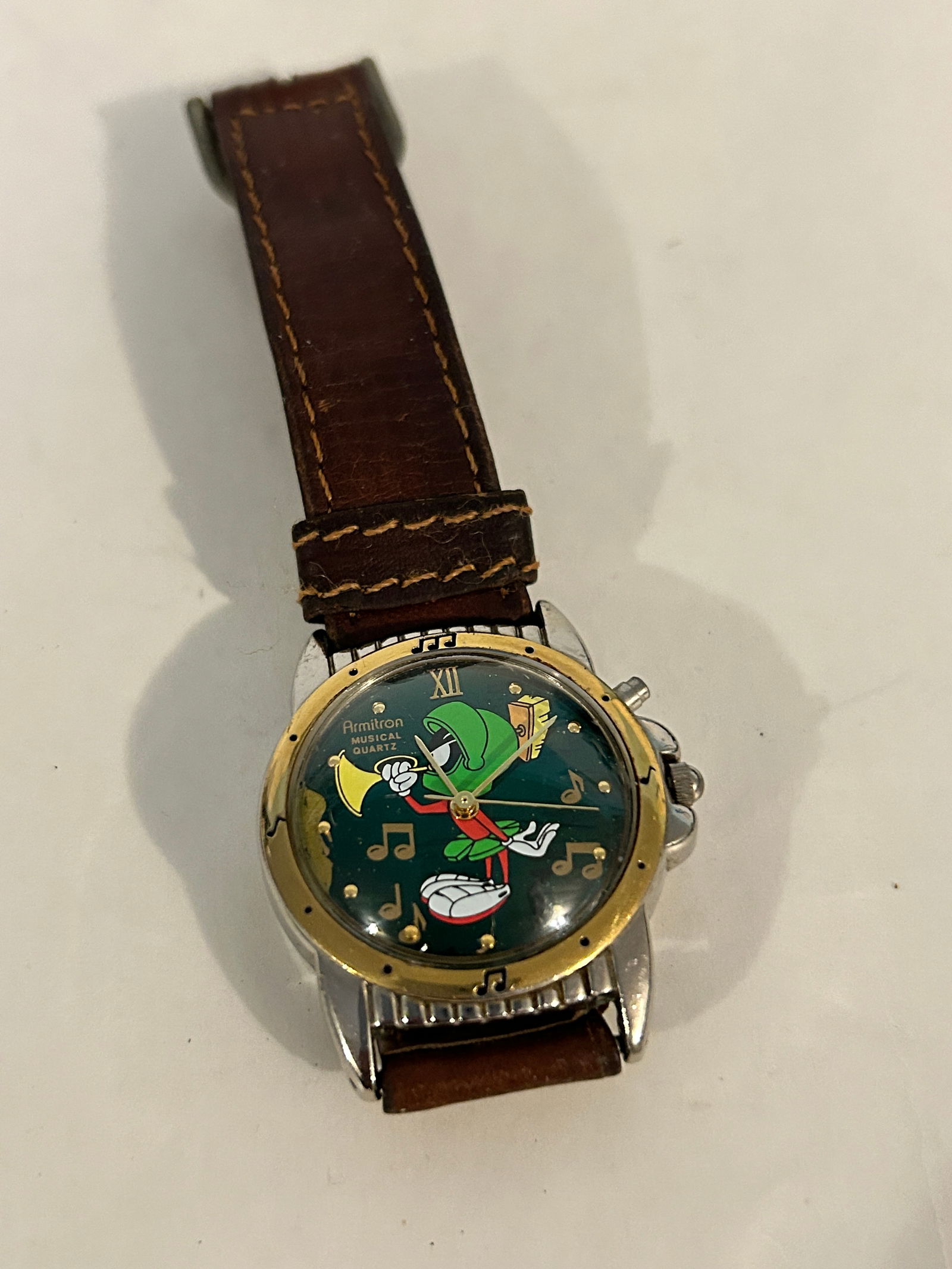 Vintage Armitron musicle working Watch 1994 95-6-7-8: Vintage Armitron musicle working Watch 1994 95-6-7-8 Please view all photos as they are part of the description and condition of this Item, Feel free to contact me with questions or picture requests!