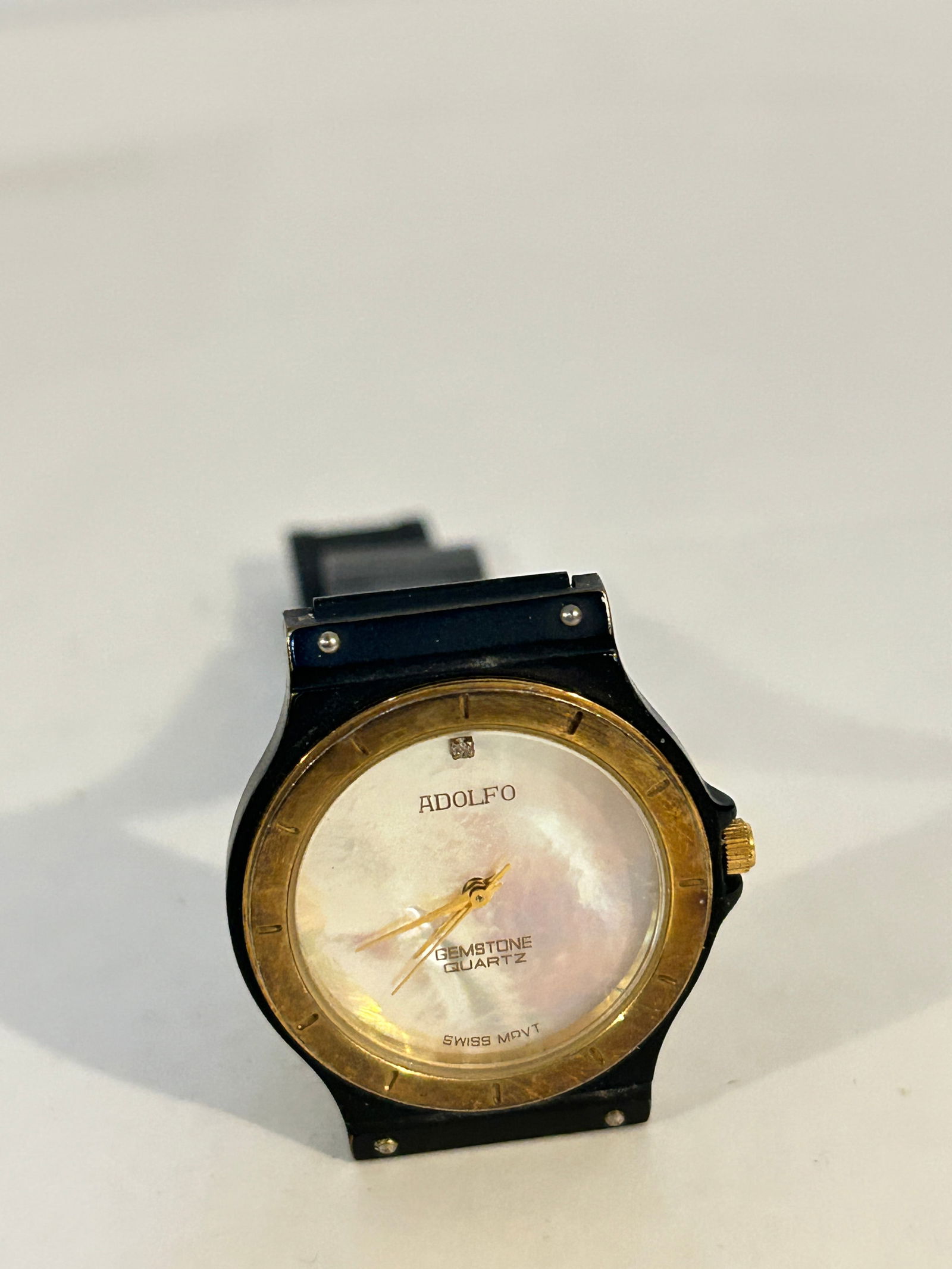 Vintage Adolfo mother of pearl quartz working Watch: Vintage Adolfo mother of pearl quartz working Watch Please view all photos as they are part of the description and condition of this Item, Feel free to contact me with questions or picture requests! U