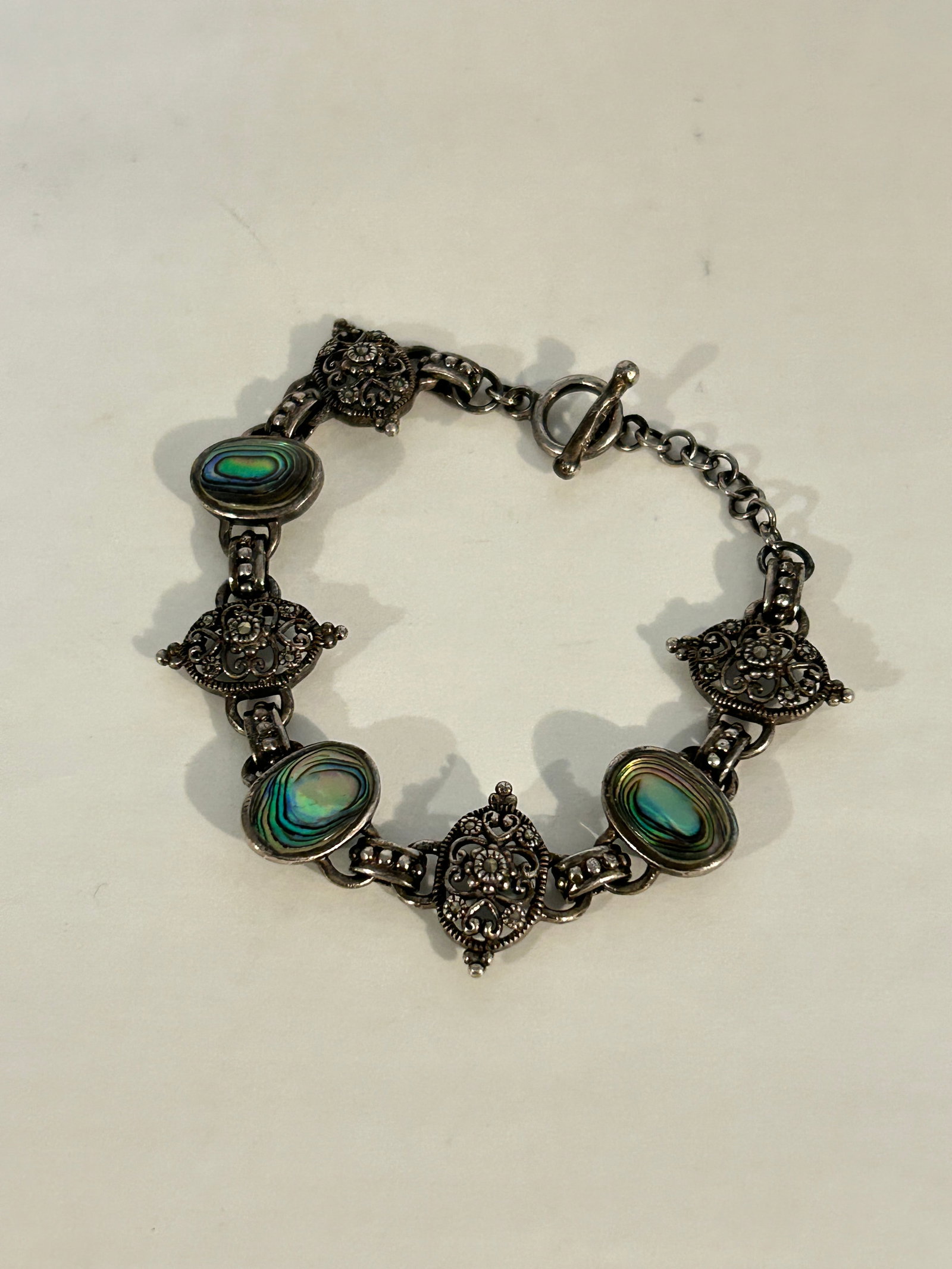 Vintage Sterling Silver marcasite filigree Bracelet 7": Vintage Sterling Silver marcasite filigree Bracelet 7" Please view all photos as they are part of the description and condition of this Item, Feel free to contact me with questions or picture requests
