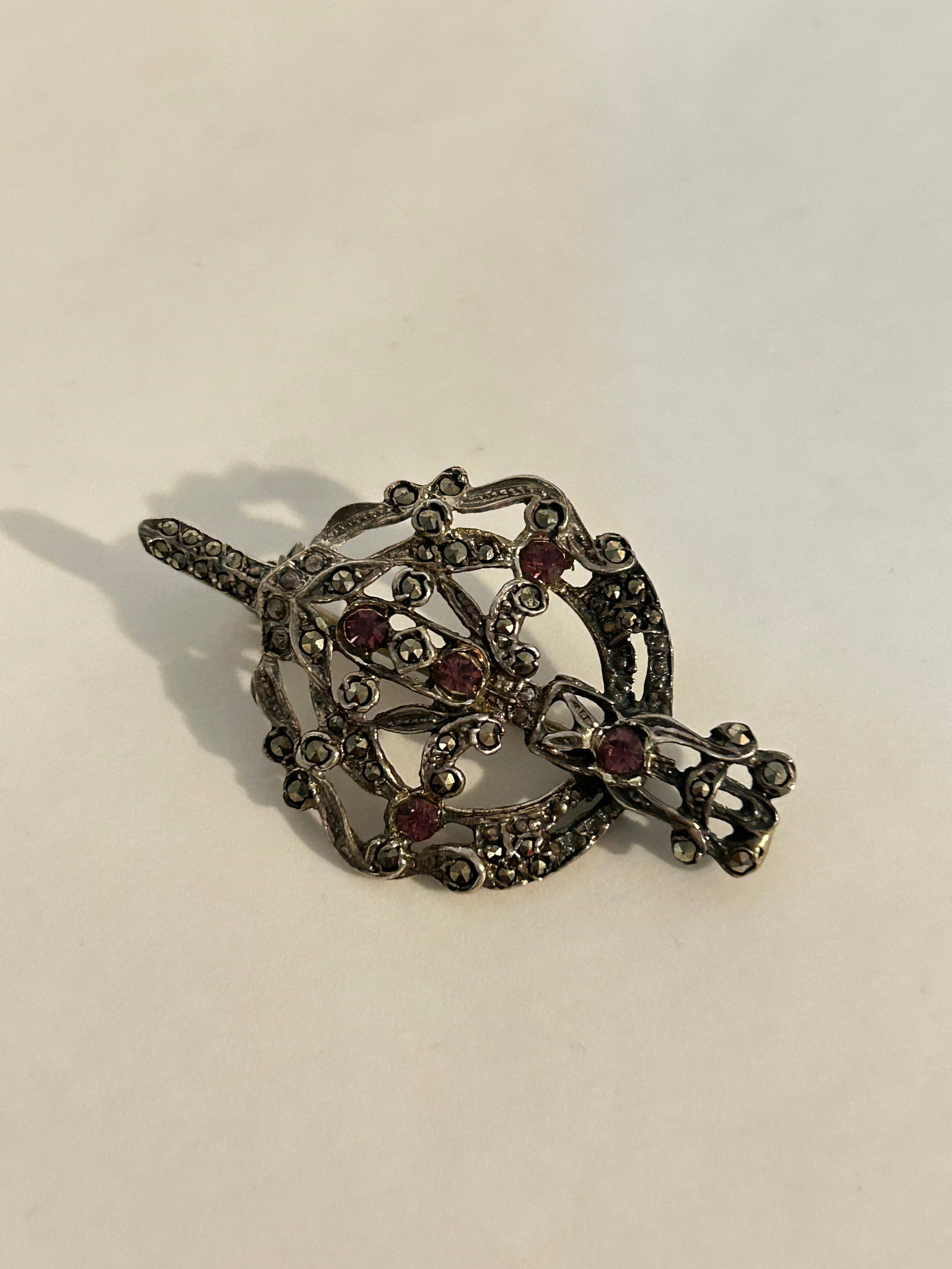 Vintage Sterling Silver marcasite Brooch: Vintage Sterling Silver marcasite Brooch Please view all photos as they are part of the description and condition of this Item, Feel free to contact me with questions or picture requests! Used Item AS