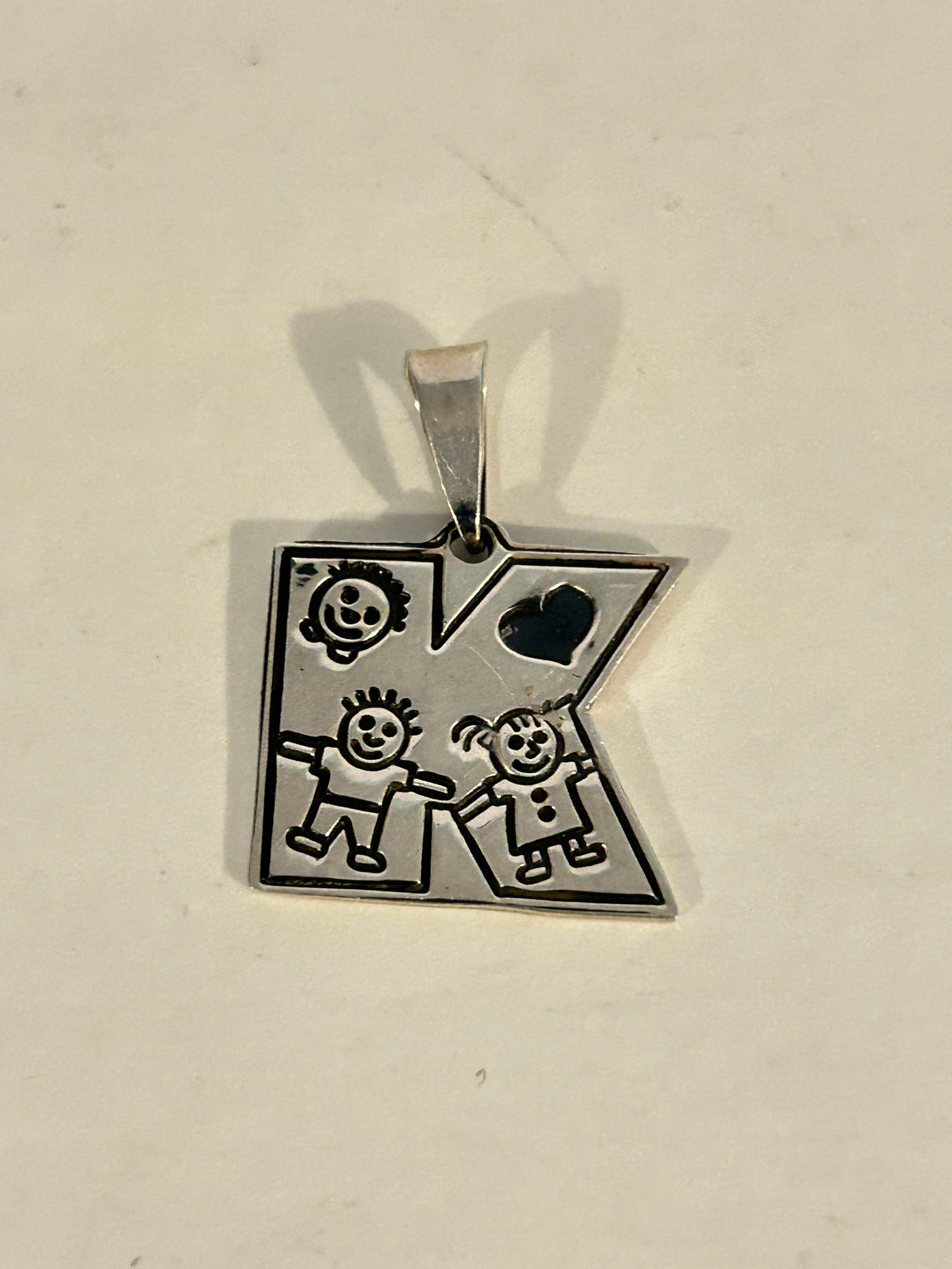 Vintage Sterling Silver K Pendant: Vintage Sterling Silver K Pendant Please view all photos as they are part of the description and condition of this Item, Feel free to contact me with questions or picture requests! Used Item AS IS