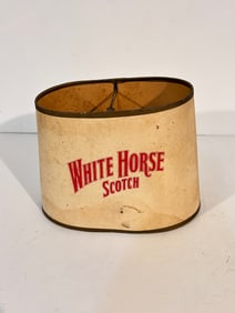 Vintage old Scotch lamp shade has a small tear