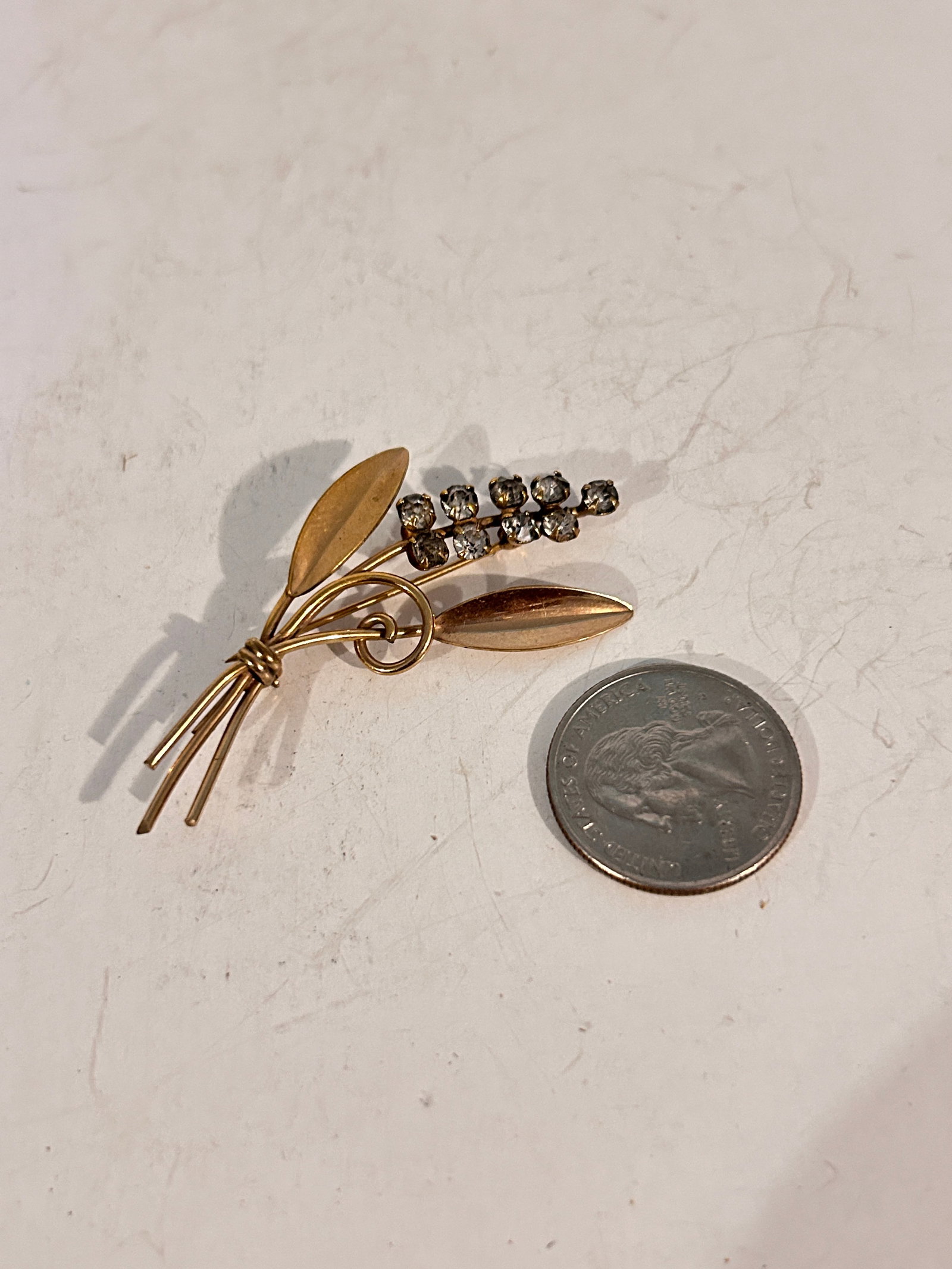 Vintage gold filled rhinestone Brooch: Vintage gold filled rhinestone Brooch Please view all photos as they are part of the description and condition of this Item, Feel free to contact me with questions or picture requests! Used Item AS IS