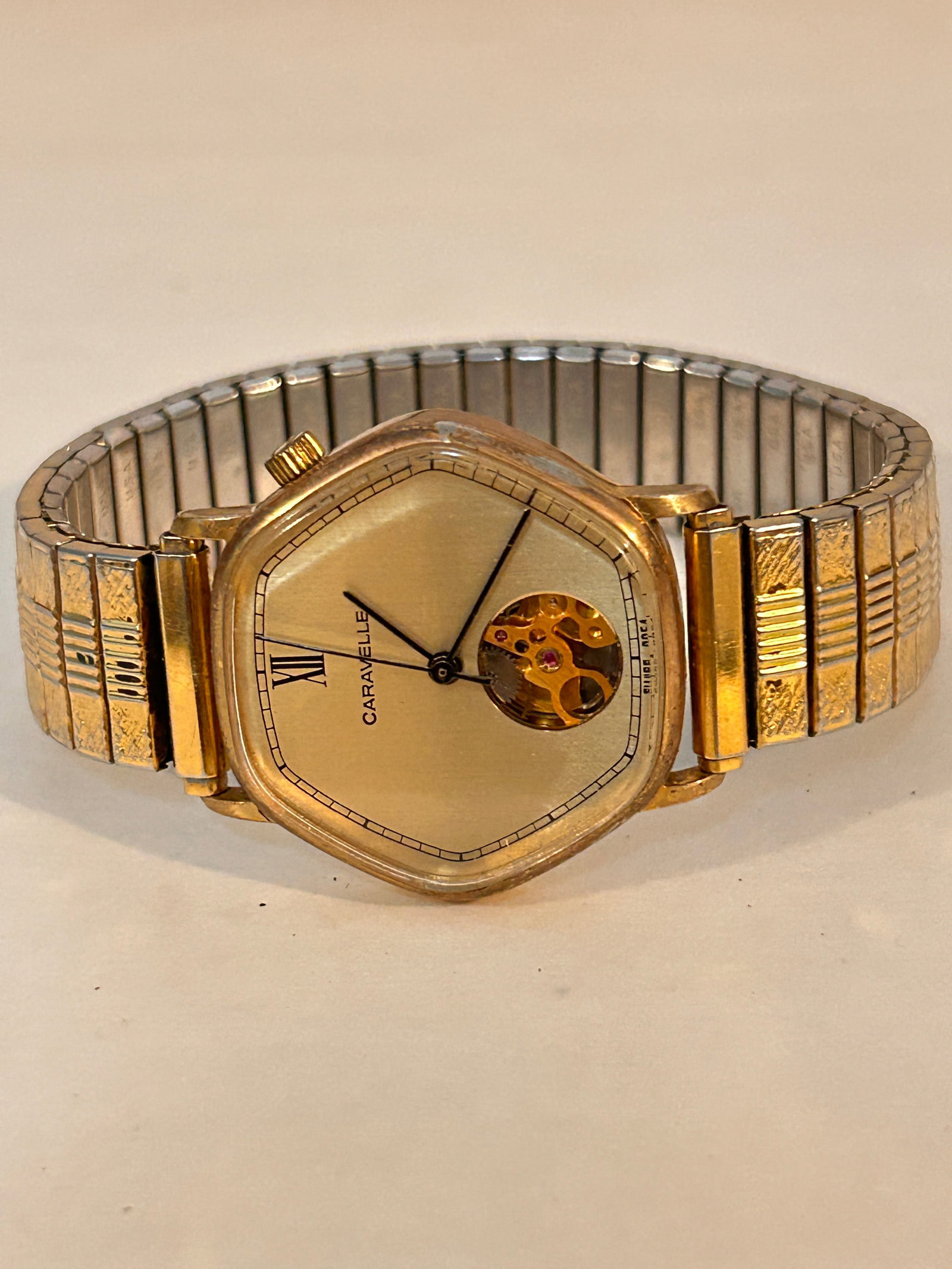 Vintage 1978 Caravelle Skeleton pep hole Mechanical Wristwatch Swiss Working: Vintage 1978 Caravelle Skeleton pep hole Mechanical Wristwatch Swiss Working Please view all photos as they are part of the description and condition of this Item, Feel free to contact me with questio