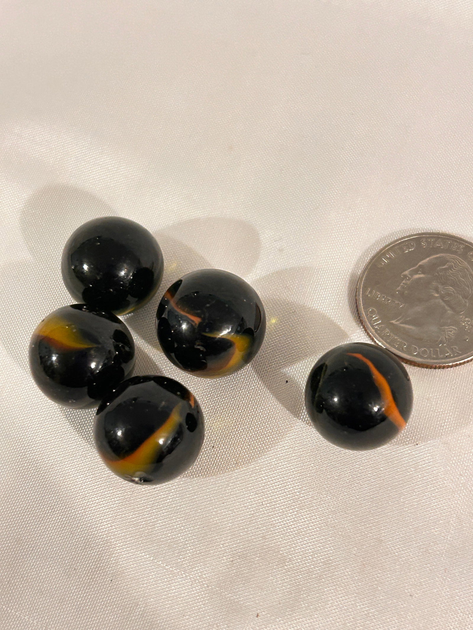 Vintage lot of 5 black & brown swirl Marbles: Vintage lot of 5 black & brown swirl Marbles Please view all photos as they are part of the description and condition of this Item, Feel free to contact me with questions or picture requests! Used Ite