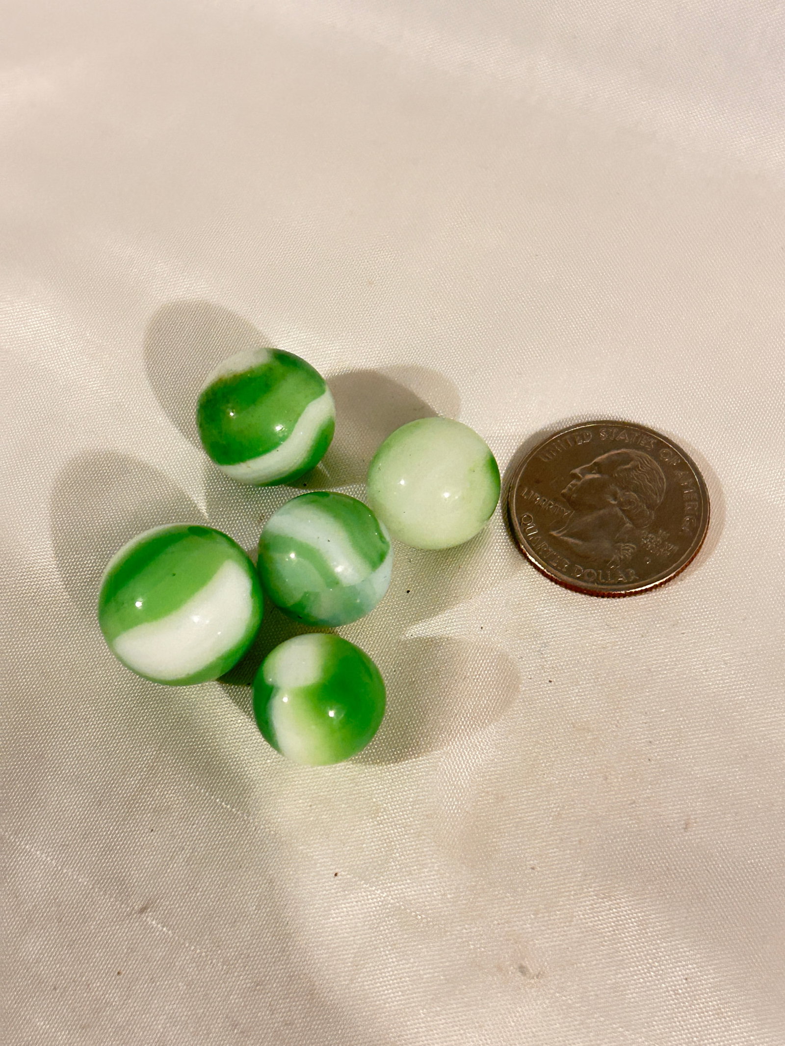 Vintage lot of 5 green & white Marbles: Vintage lot of 5 green & white Marbles Please view all photos as they are part of the description and condition of this Item, Feel free to contact me with questions or picture requests! Used Item AS I