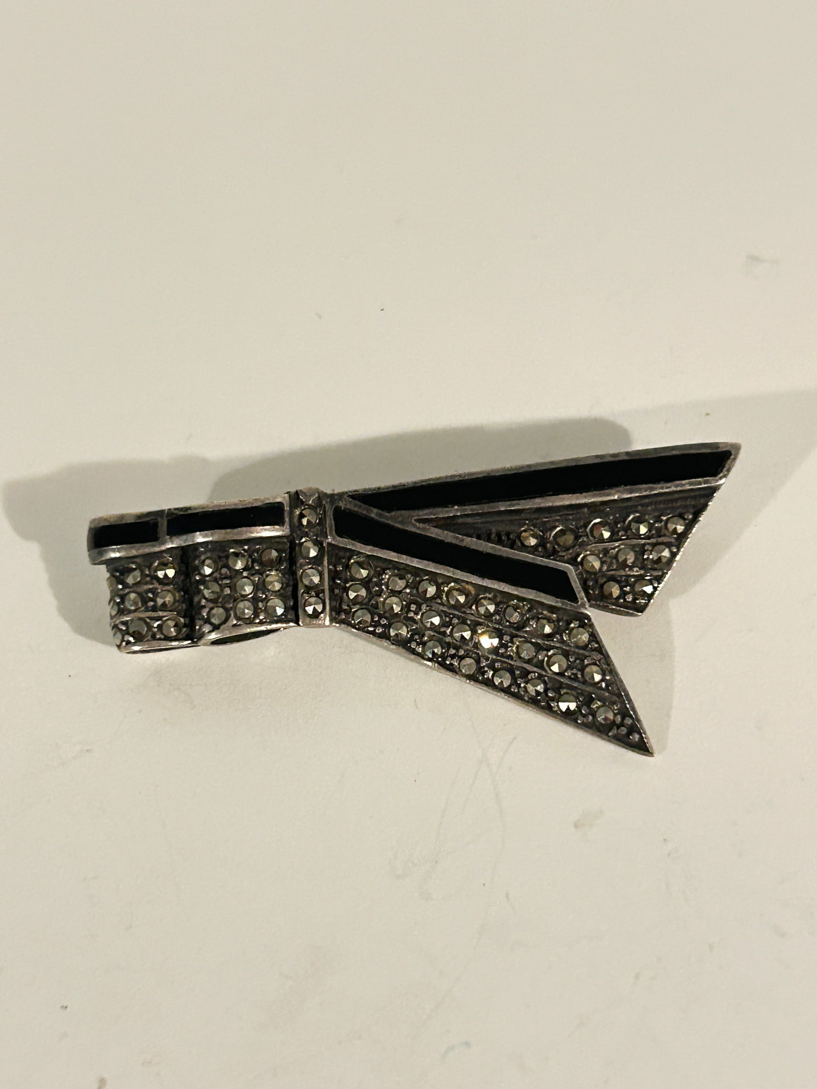 Vintage Sterling Silver marcasite onyx Brooch: Vintage Sterling Silver marcasite onyx Brooch Please view all photos as they are part of the description and condition of this Item, Feel free to contact me with questions or picture requests! Used It