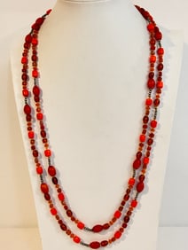 Vintage 48" long orange Beaded Necklace