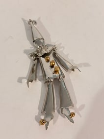 Rare Lee Menichetti pendant Scarecrow and it measures 4-1/2" long.It is made of Sterling silver with