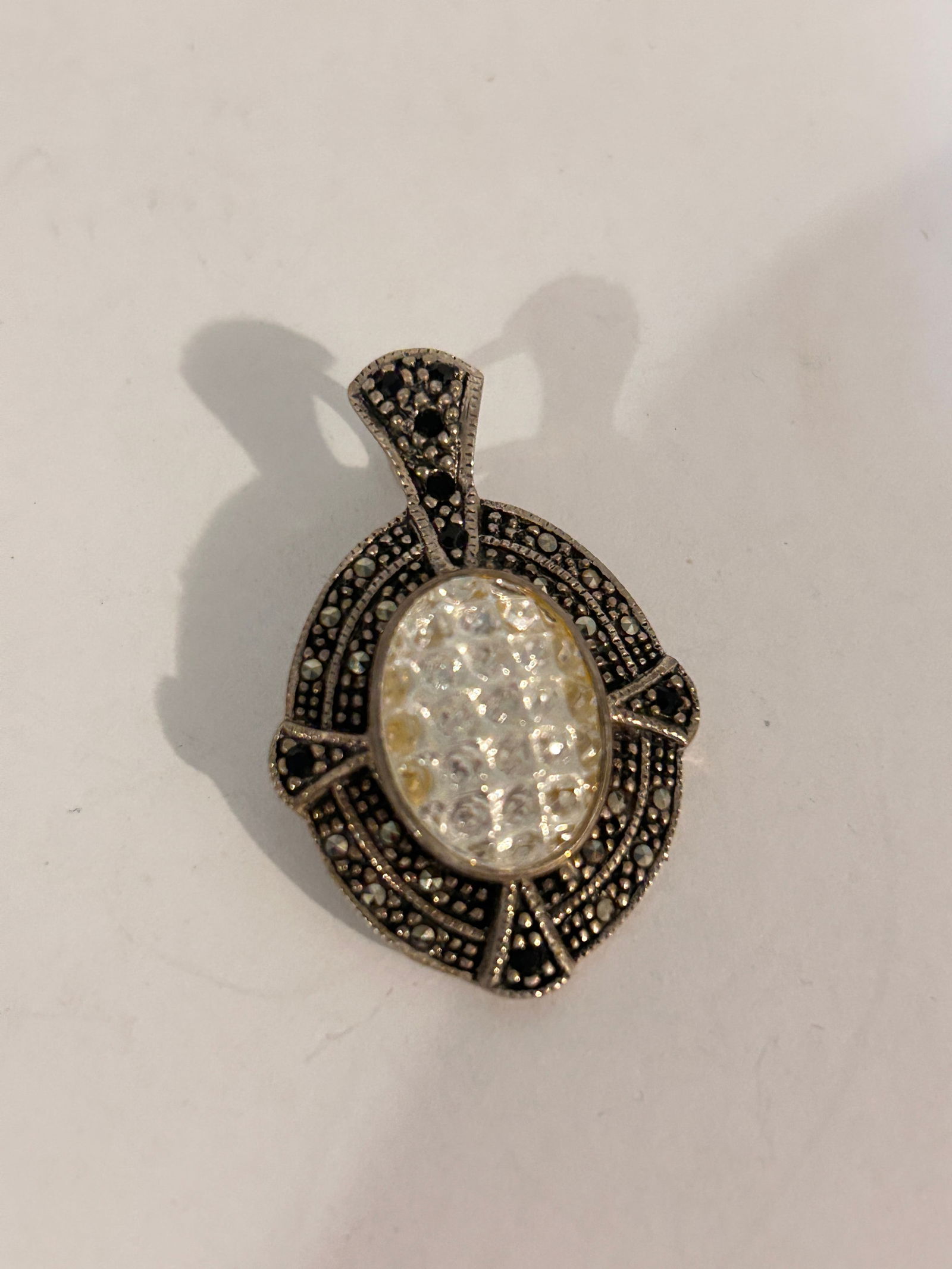 SU Sterling Silver Marcasite Gemstone Oval Pendant: SU Sterling Silver Marcasite Gemstone Oval Pendant Please view all photos as they are part of the description and condition of this Item, Feel free to contact me with questions or picture requests! Us