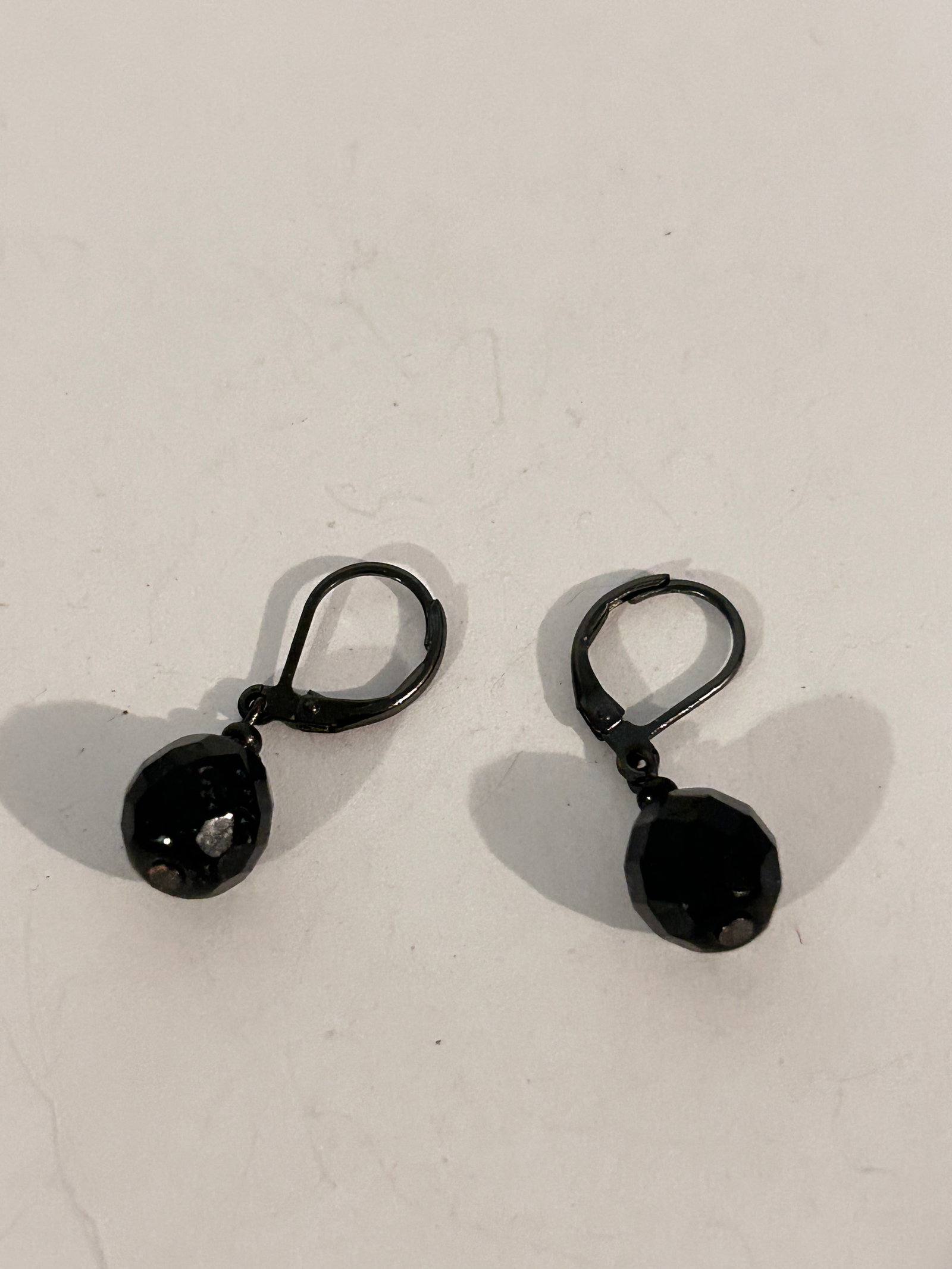 Vintage black glass Pierced Earrings: Vintage black glass Pierced Earrings Please view all photos as they are part of the description and condition of this Item, Feel free to contact me with questions or picture requests! Used Item AS IS