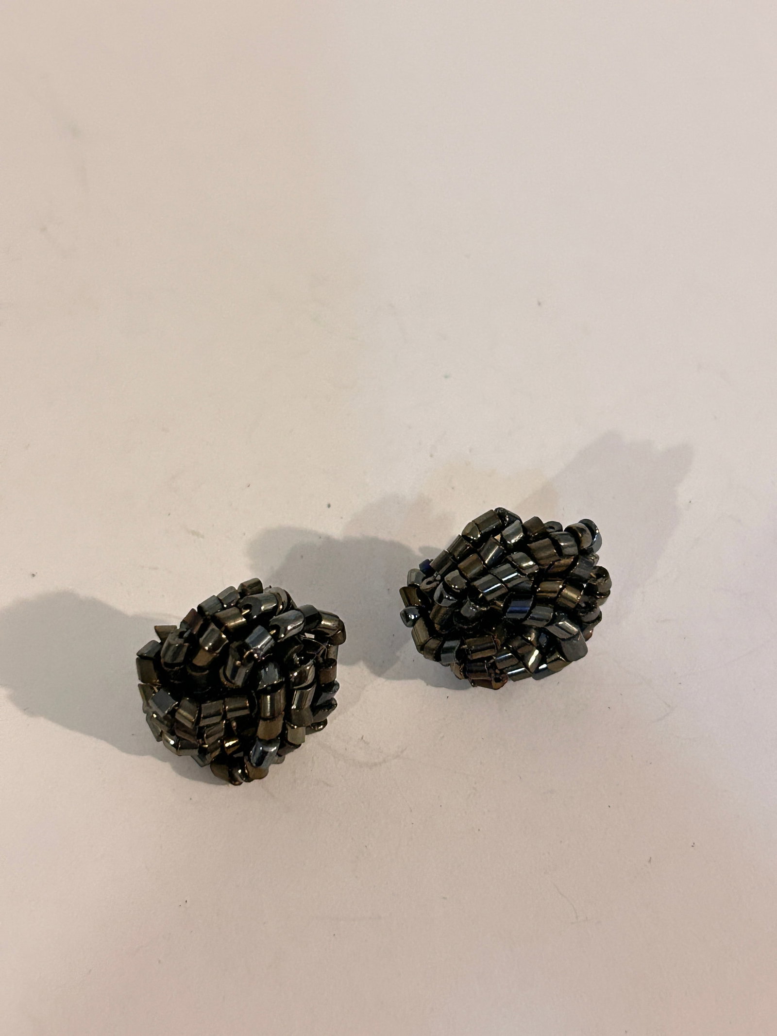 Vintage Hematite/black Earrings: Vintage Hematite/black Earrings Please view all photos as they are part of the description and condition of this Item, Feel free to contact me with questions or picture requests! Used Item AS IS