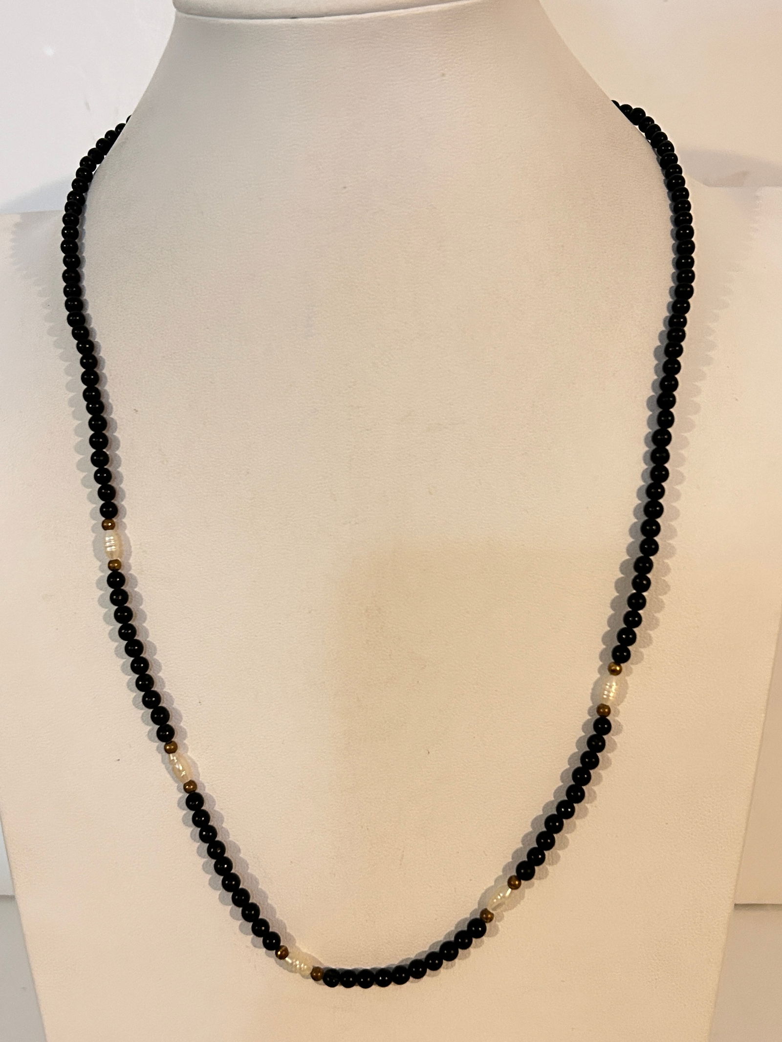 Vintage black mini bead Necklace sz 24": Vintage black mini bead Necklace sz 24" Please view all photos as they are part of the description and condition of this Item, Feel free to contact me with questions or picture requests! Used Item AS
