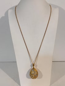 Vintage gold tone rhinestone egg pendant Necklace 32"