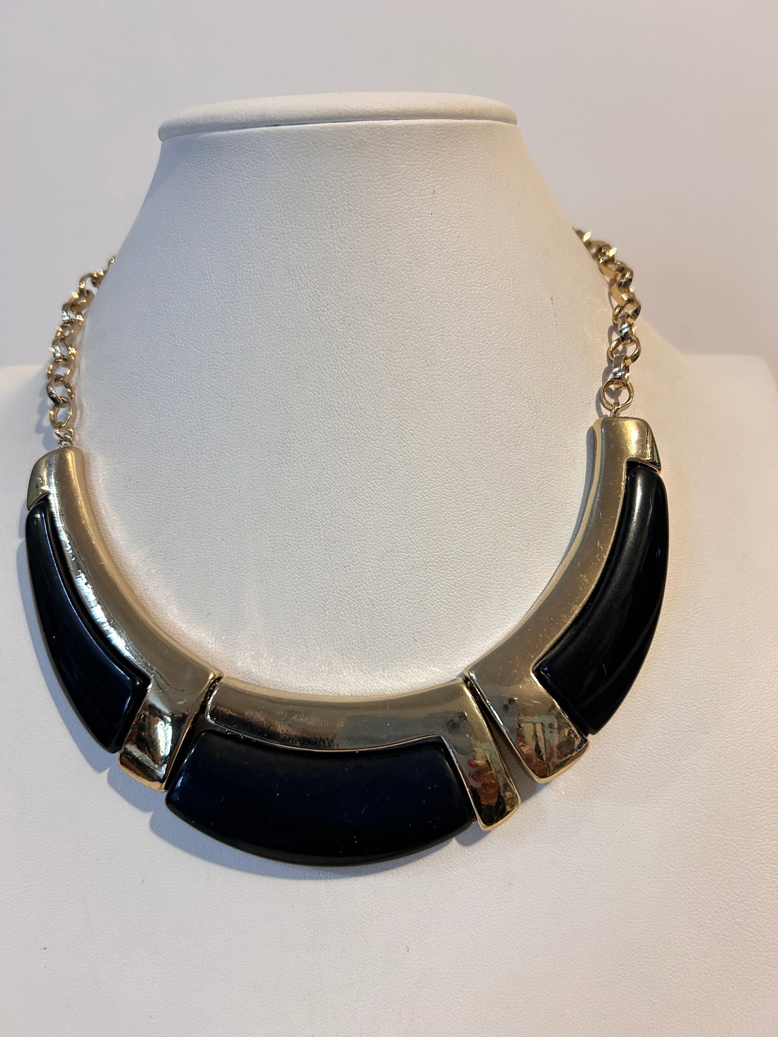 Vintage black enamel gold tone choker Necklace: Vintage black enamel gold tone choker Necklace Please view all photos as they are part of the description and condition of this Item, Feel free to contact me with questions or picture requests! Used I