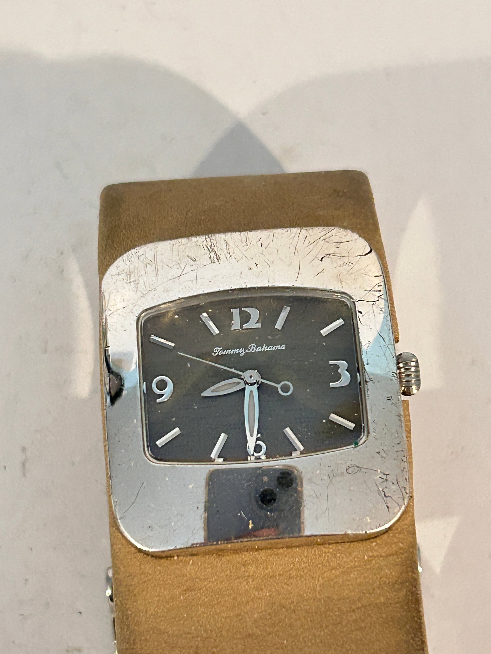 Vintage Working quartz Tommy Bahamas 925 Watch band needs gluing.: Vintage Working quartz Tommy Bahamas 925 Watch band needs gluing. Please view all photos as they are part of the description and condition of this Item, Feel free to contact me with questions or pictu