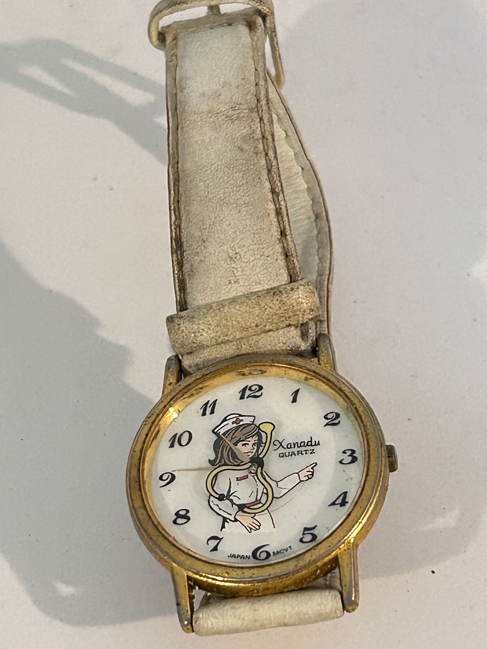 Vintage XANADU Quartz not working red cross lady Watch: Vintage XANADU Quartz not working red cross lady Watch Please view all photos as they are part of the description and condition of this Item, Feel free to contact me with questions or picture requests