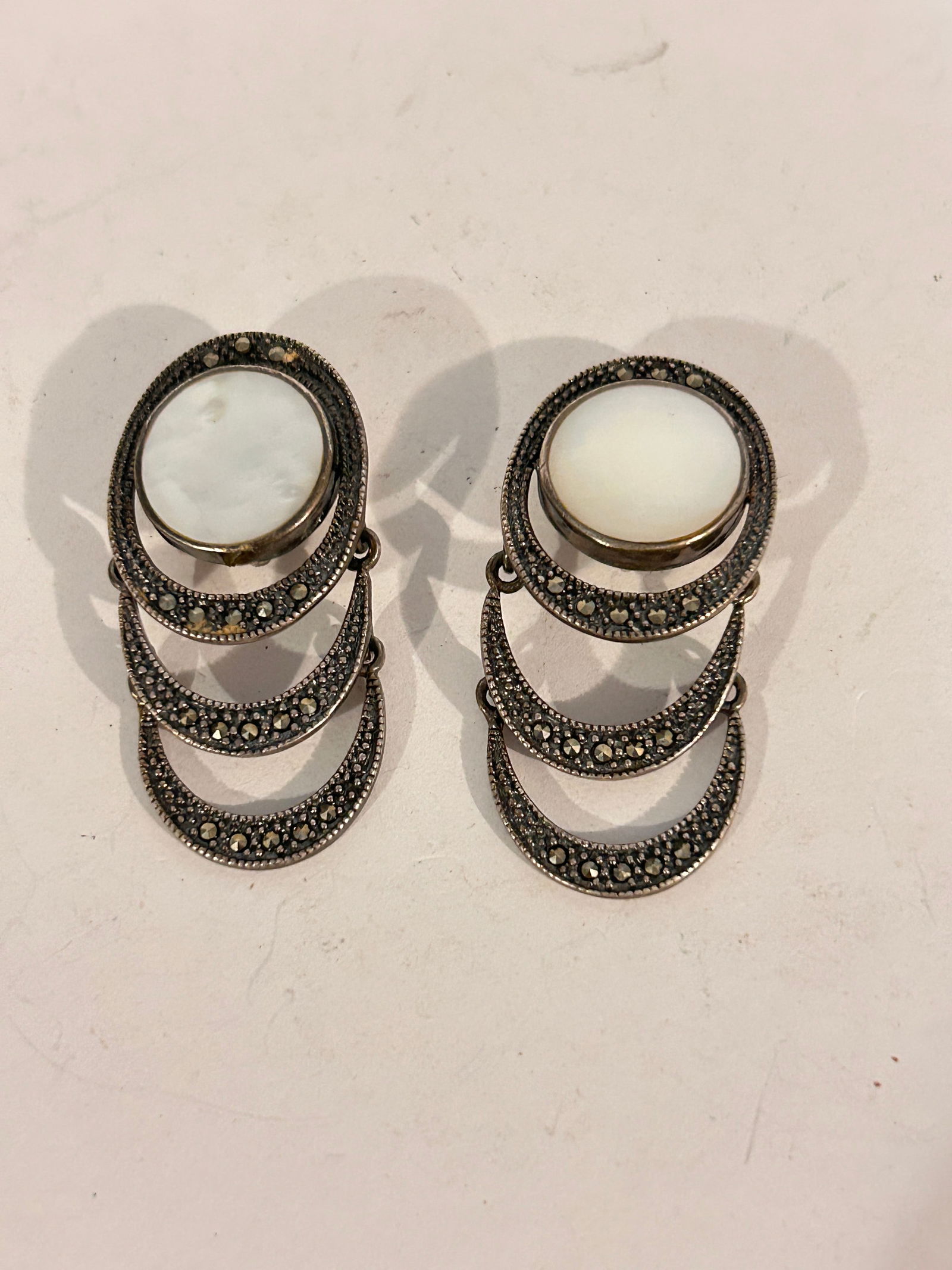 Vintage Sterling Silver mother of pearl marcasite triple tear Earrings: Vintage Sterling Silver mother of pearl marcasite triple tear Earrings Please view all photos as they are part of the description and condition of this Item, Feel free to contact me with questions or