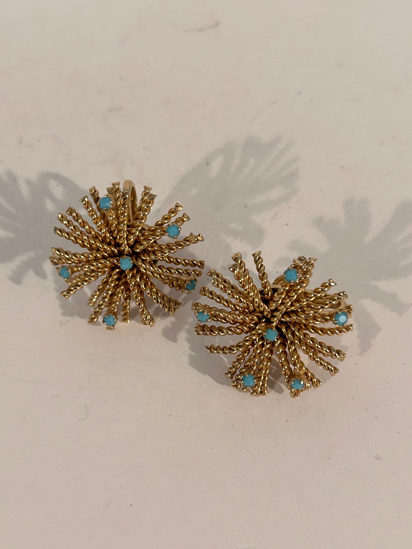 Vintage 1960s Bergere gold tone Turquoise clip on Earrings: Vintage 1960s Bergere gold tone Turquoise clip on Earrings Please view all photos as they are part of the description and condition of this Item, Feel free to contact me with questions or picture requ