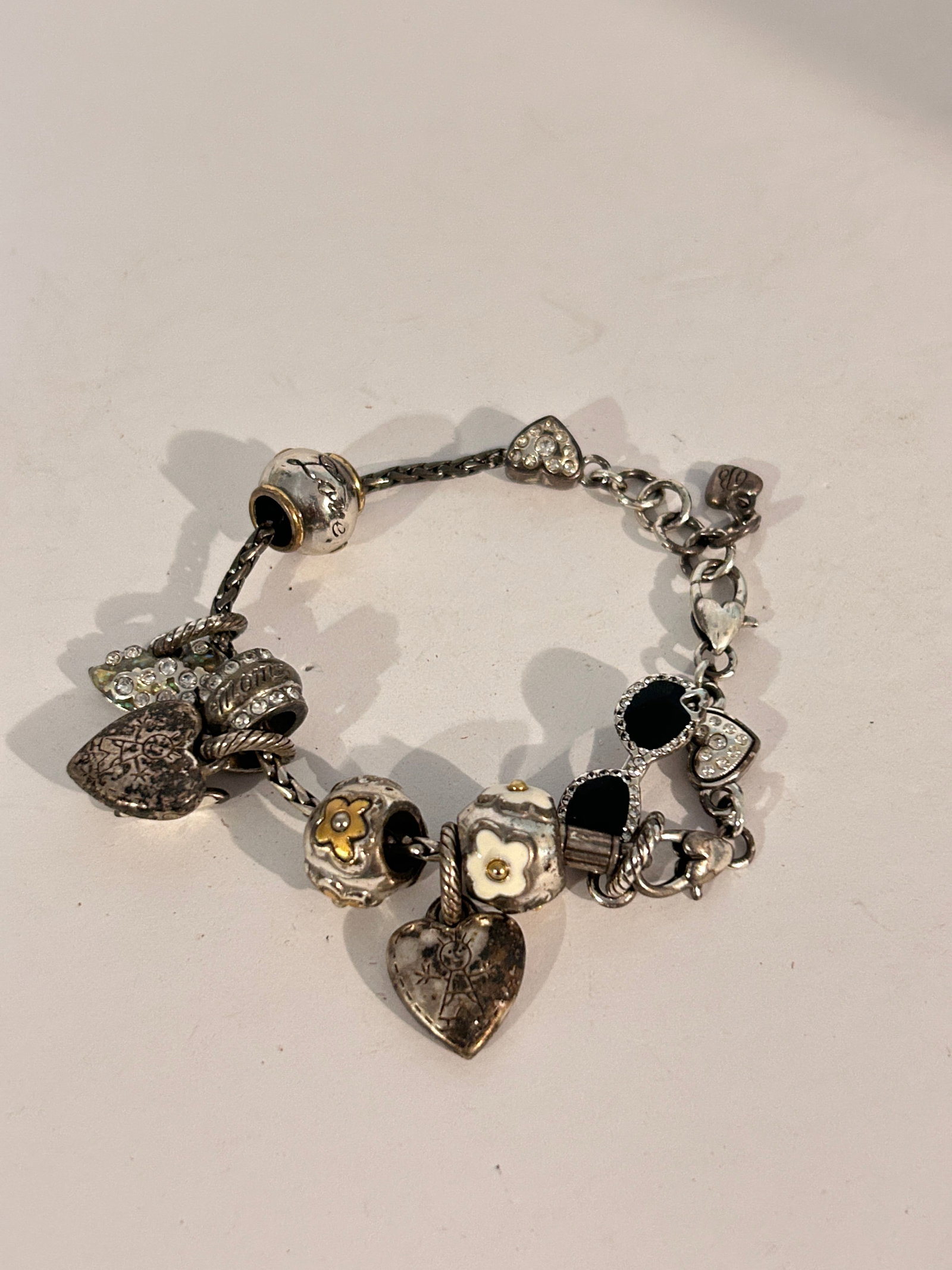 Vintage Brighton charm Bracelet 7": Vintage Brighton charm Bracelet 7" Please view all photos as they are part of the description and condition of this Item, Feel free to contact me with questions or picture requests! Used Item AS IS