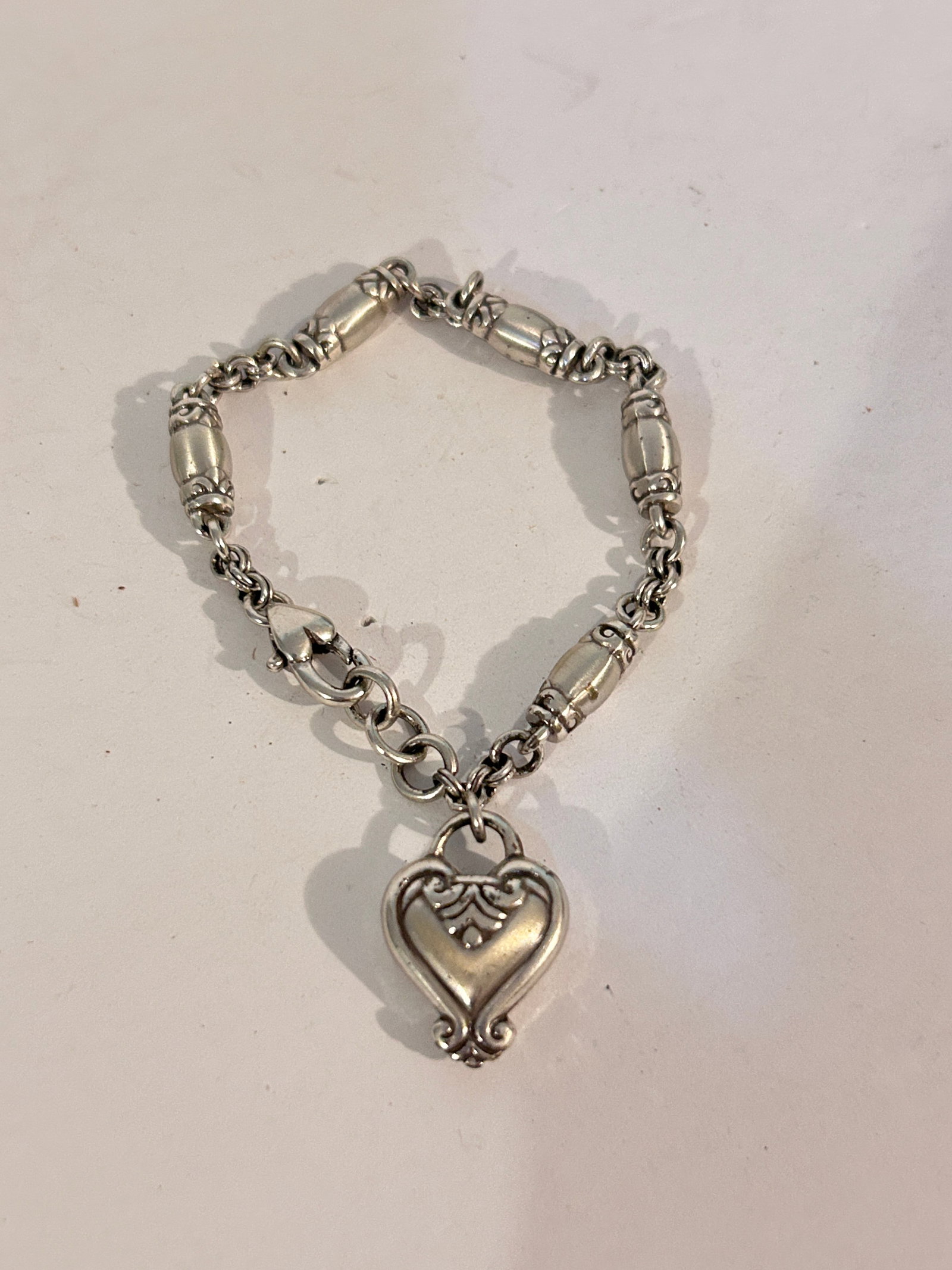 Vintage Brighton heart Bracelet 7": Vintage Brighton heart Bracelet 7" Please view all photos as they are part of the description and condition of this Item, Feel free to contact me with questions or picture requests! Used Item AS IS