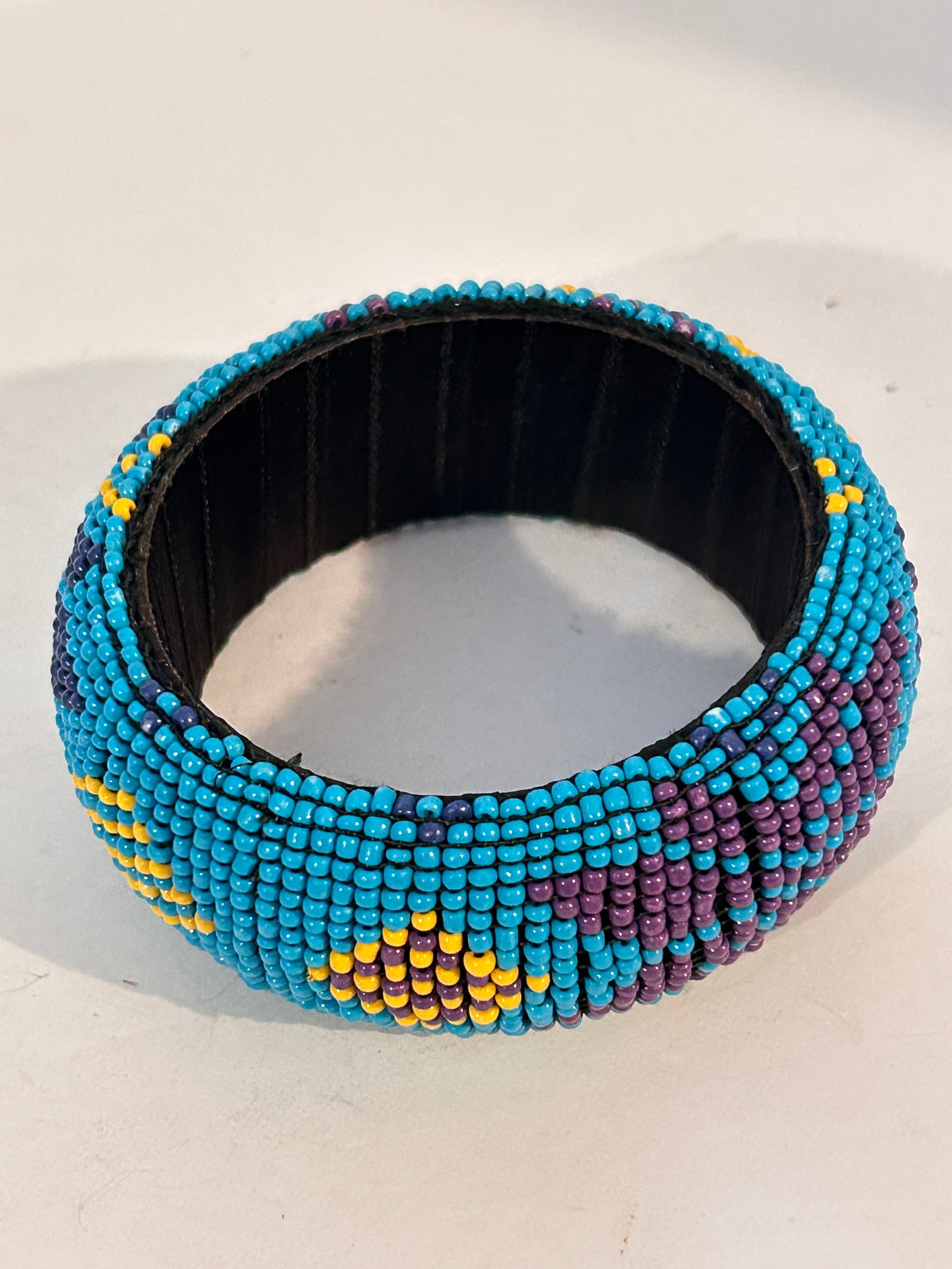 Vintage wide bead colorful bangle Bracelet 8": Vintage wide bead colorful bangle Bracelet 8" Please view all photos as they are part of the description and condition of this Item, Feel free to contact me with questions or picture requests! Used It