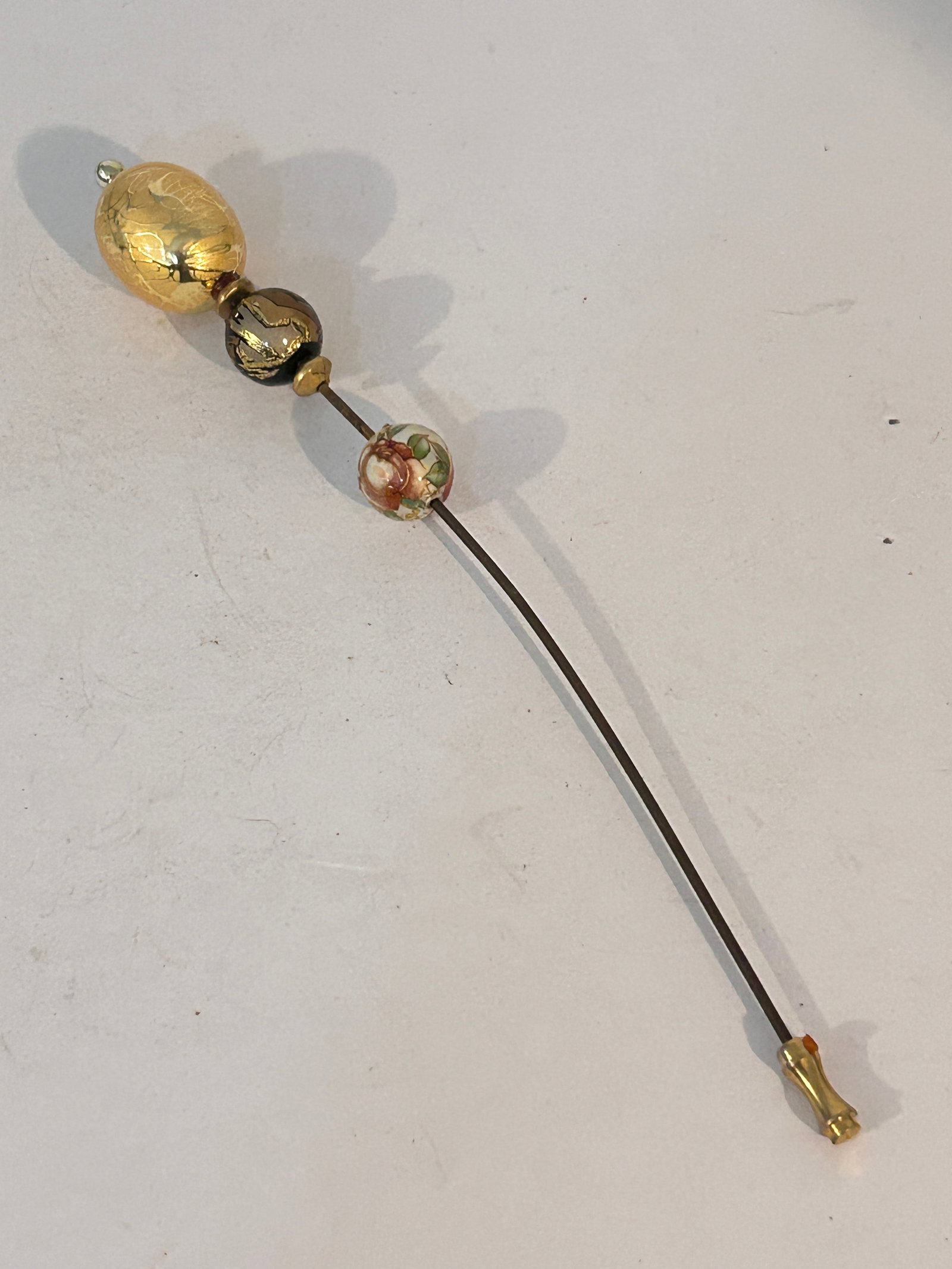 Vintage hat Pin: Vintage hat Pin Please view all photos as they are part of the description and condition of this Item, Feel free to contact me with questions or picture requests! Used Item AS IS Please view all photo