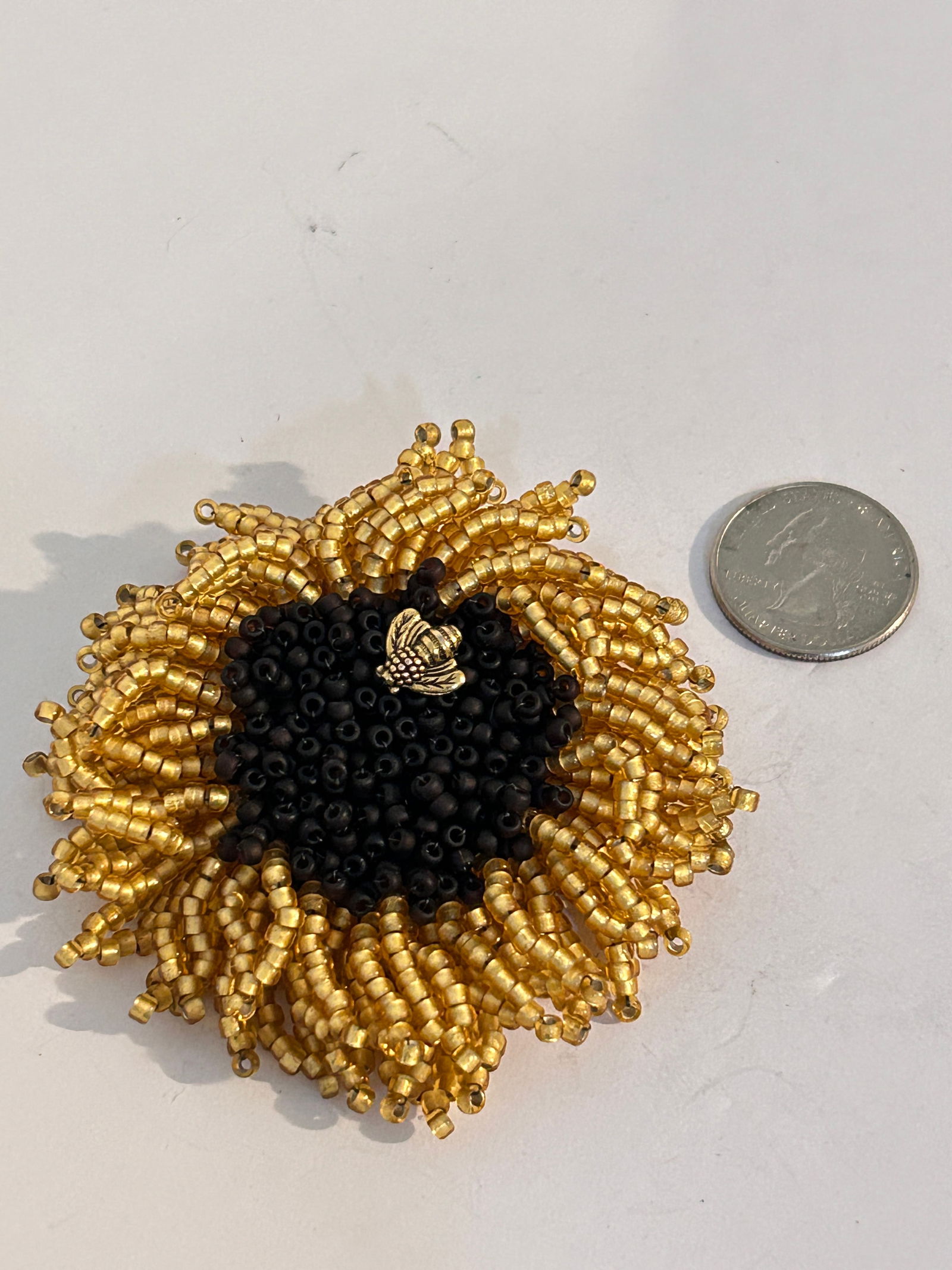 Vintage Beaded Floral Brooch: Vintage gold tone mushroom Brooch Please view all photos as they are part of the description and condition of this Item, Feel free to contact me with questions or picture requests! Used Item AS IS Ple