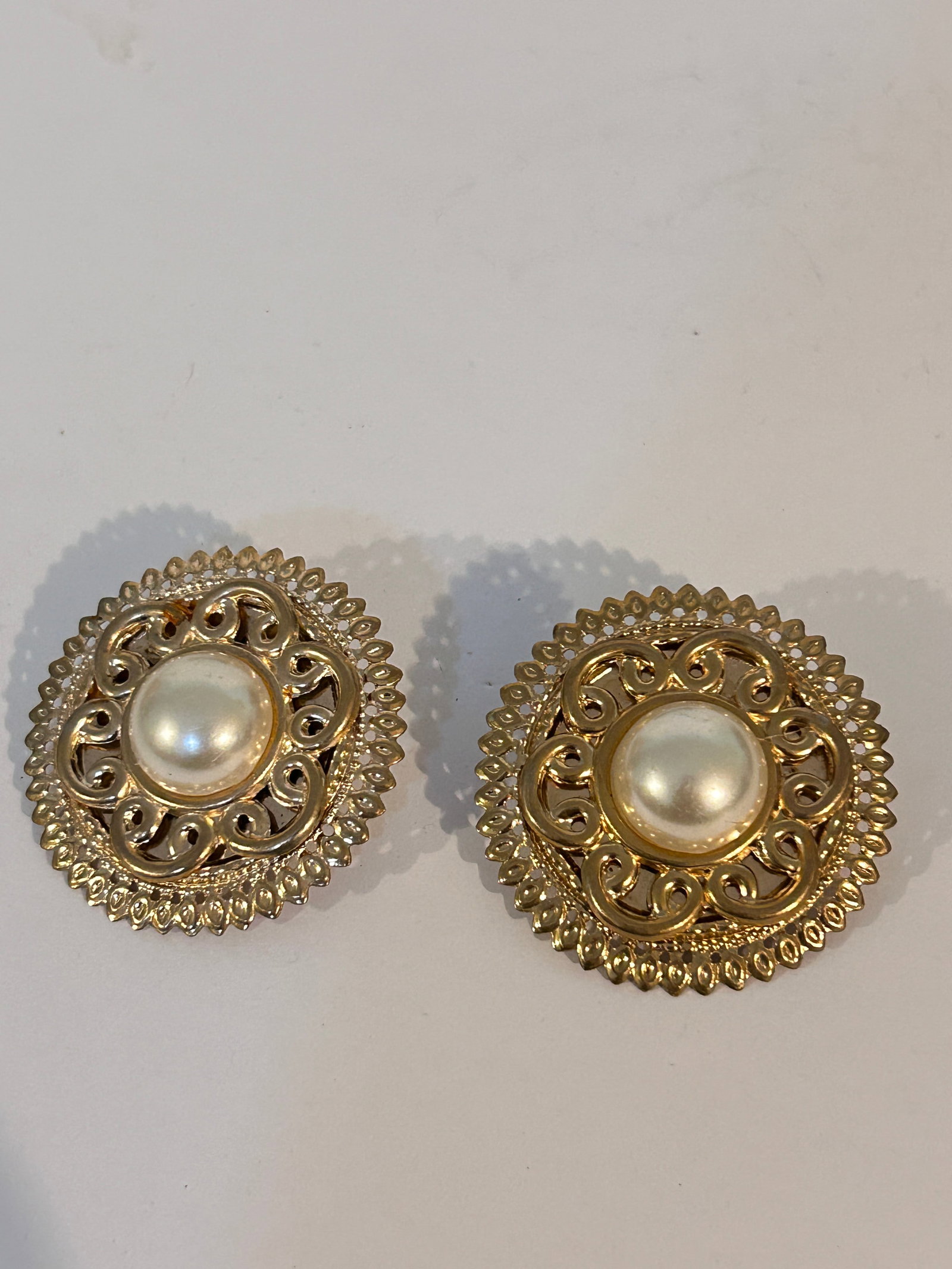 Vintage Gold tone Faux pearl wide Earrings: Vintage Gold tone Faux pearl wide Earrings Please view all photos as they are part of the description and condition of this Item, Feel free to contact me with questions or picture requests! Used Item 