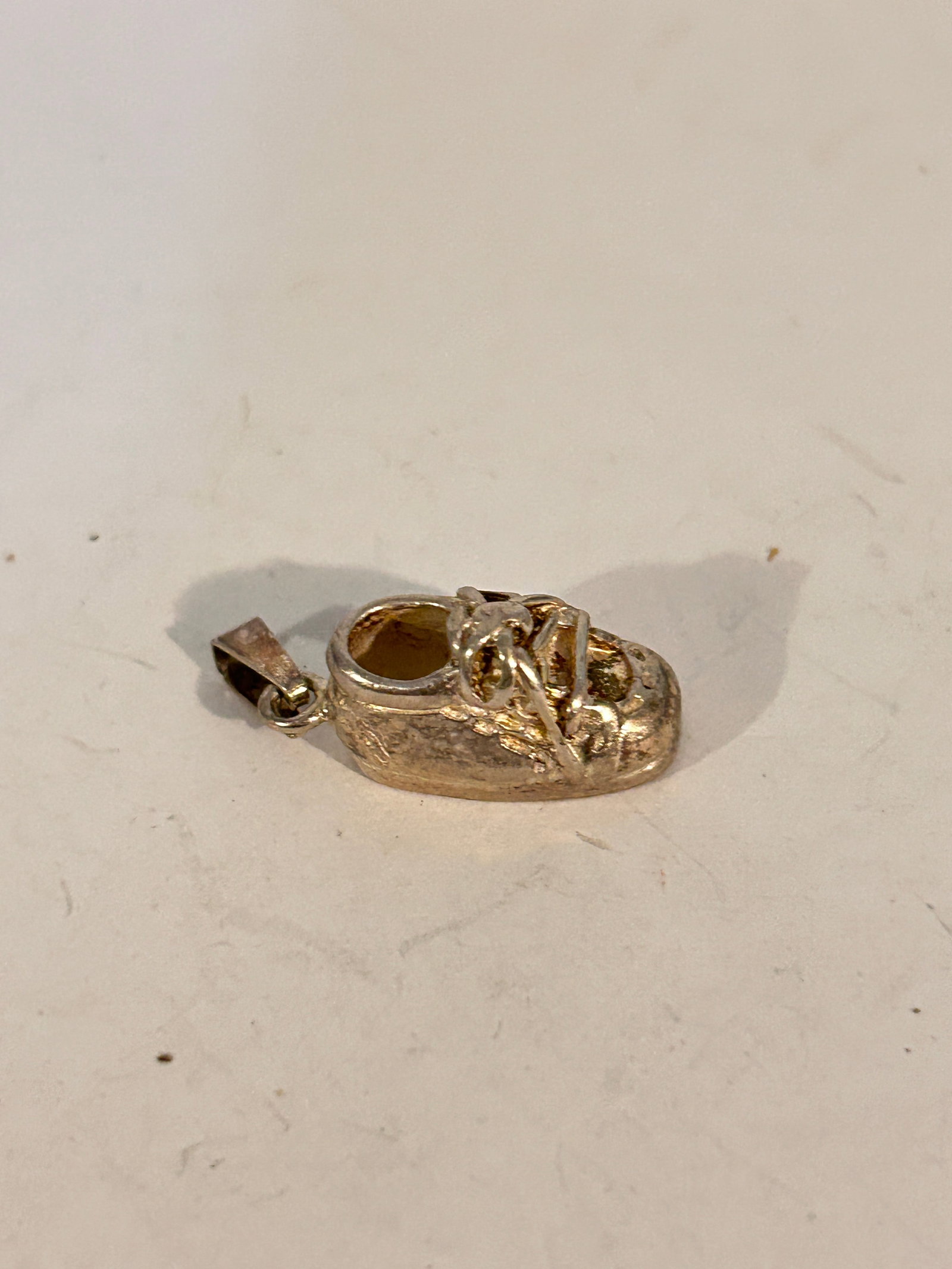 Vintage Sterling Silver Baby Shoe Pendant: Vintage Sterling Silver Baby Shoe Pendant Please view all photos as they are part of the description and condition of this Item, Feel free to contact me with questions or picture requests! Used Item A