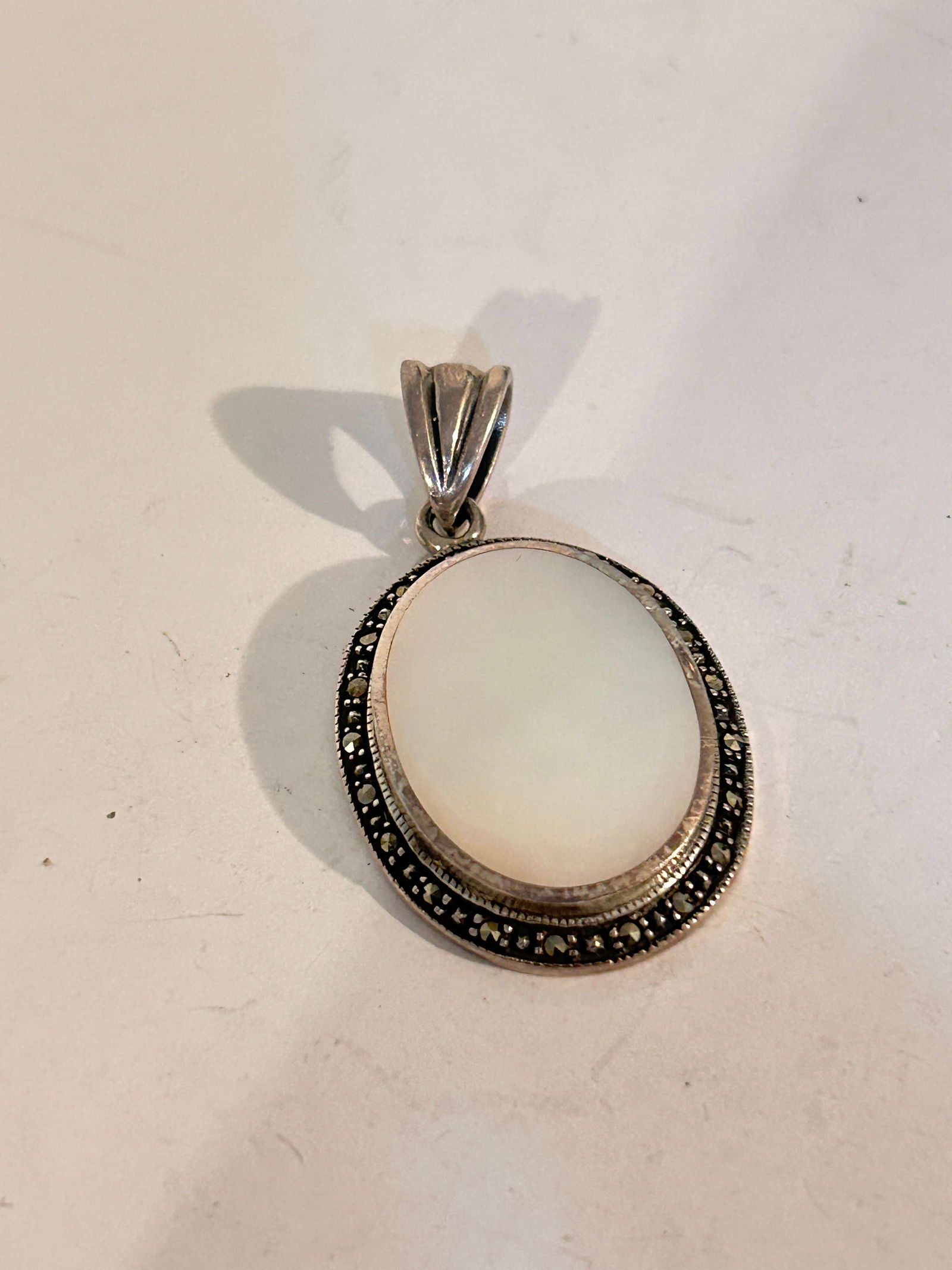 Vintage Sterling Silver Mother Of Pearl Marcasite Pendant: Vintage Sterling Silver Mother Of Pearl Marcasite Pendant Please view all photos as they are part of the description and condition of this Item, Feel free to contact me with questions or picture reque
