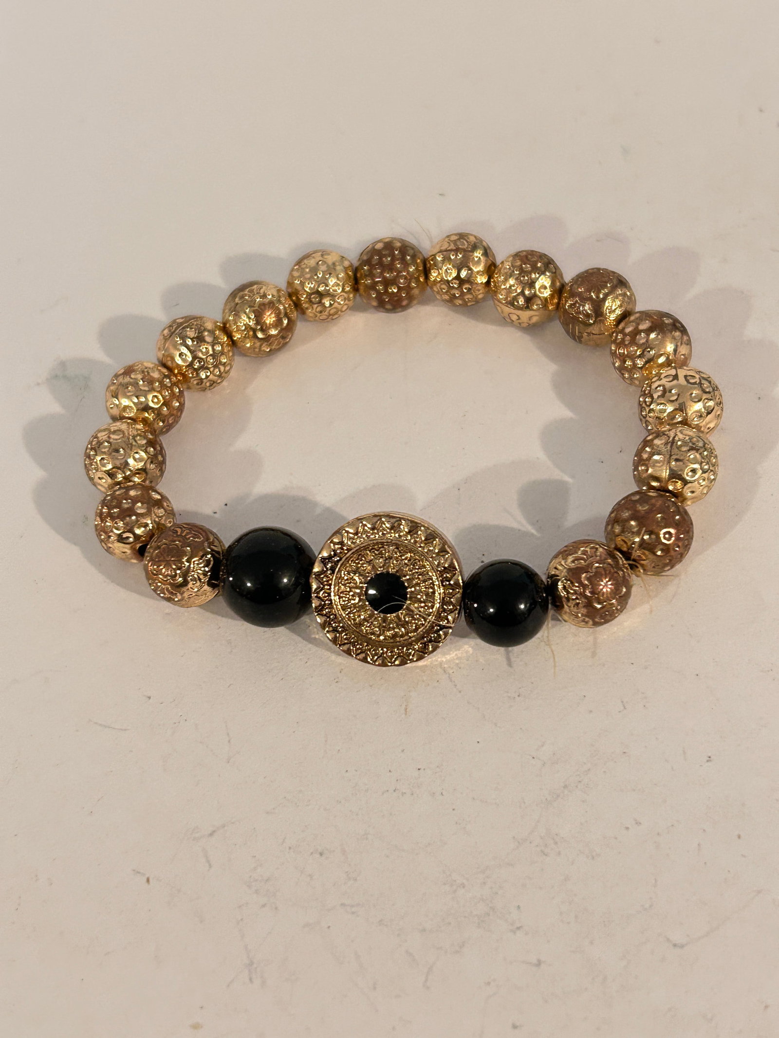 Vintage Gold tone bead stretch Bracelet 7": Vintage Gold tone bead stretch Bracelet 7" Please view all photos as they are part of the description and condition of this Item, Feel free to contact me with questions or picture requests! Used Item 