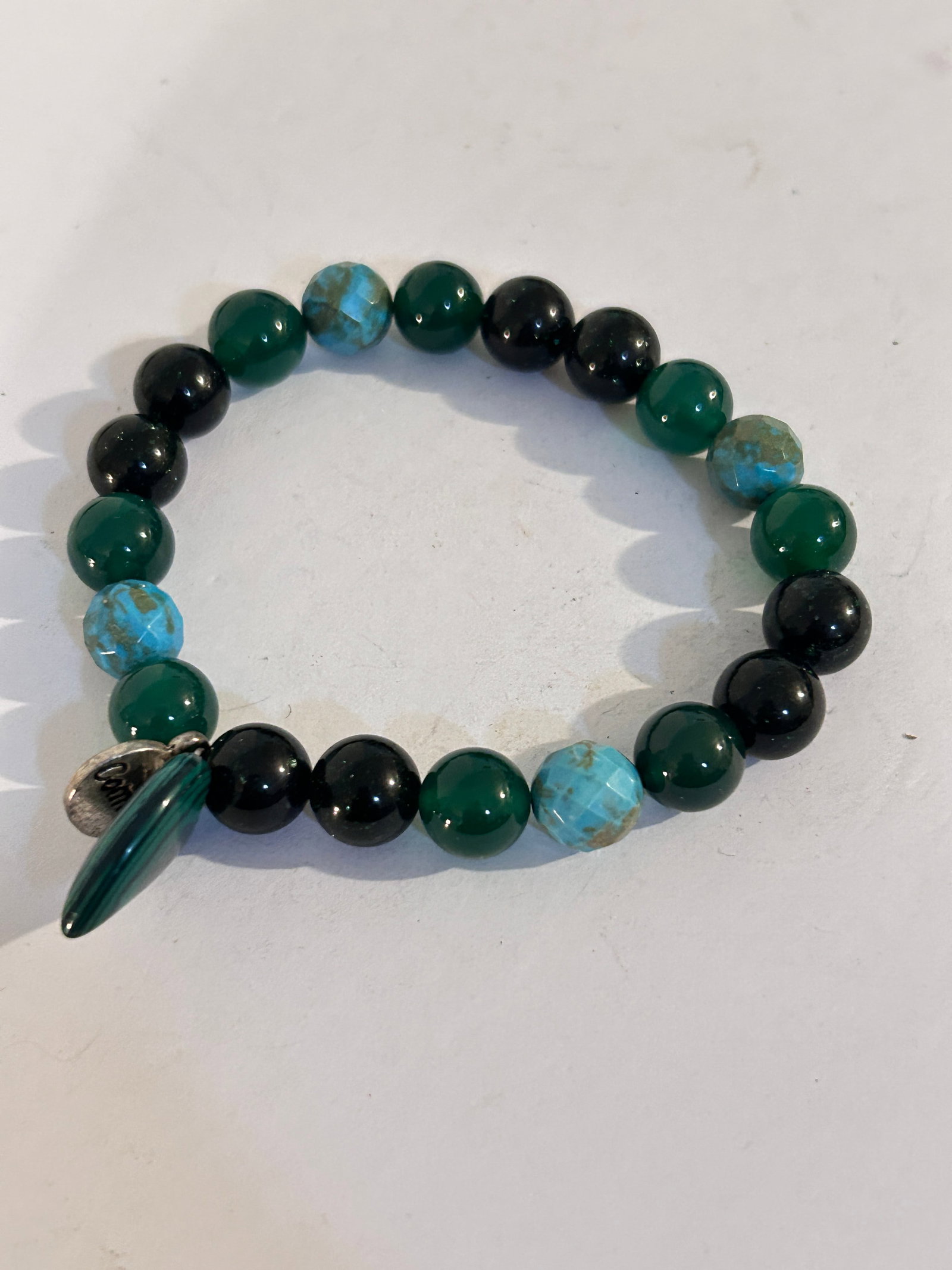 Vintage Green Gemstone Tested bead stretch Bracelet 7": Vintage Green Gemstone Tested bead stretch Bracelet 7" Please view all photos as they are part of the description and condition of this Item, Feel free to contact me with questions or picture requests