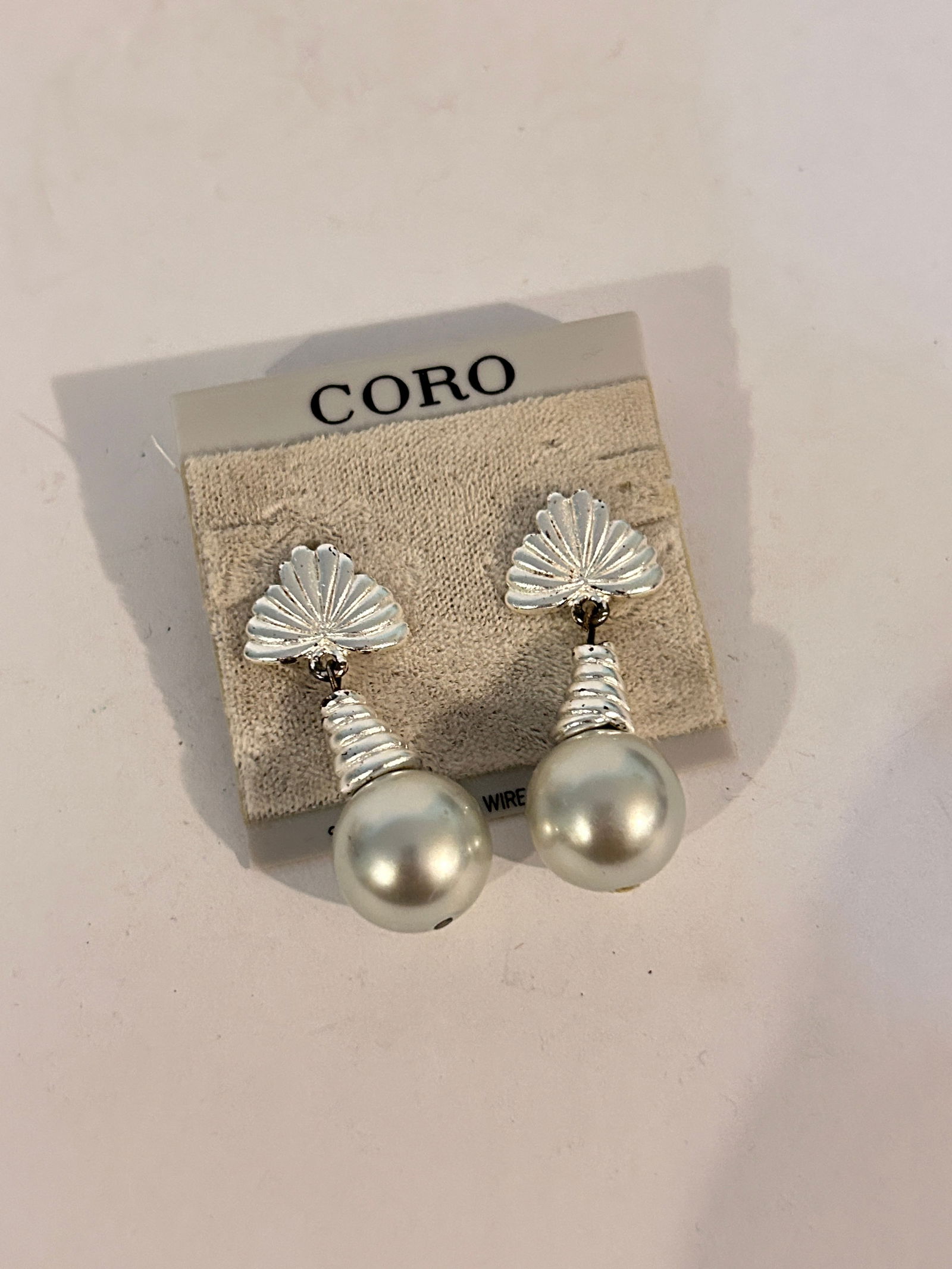 Vintage Silver Tone Faux Pearl Coro new Earrings: Vintage Silver Tone Faux Pearl Coro new Earrings Please view all photos as they are part of the description and condition of this Item, Feel free to contact me with questions or picture requests! Used