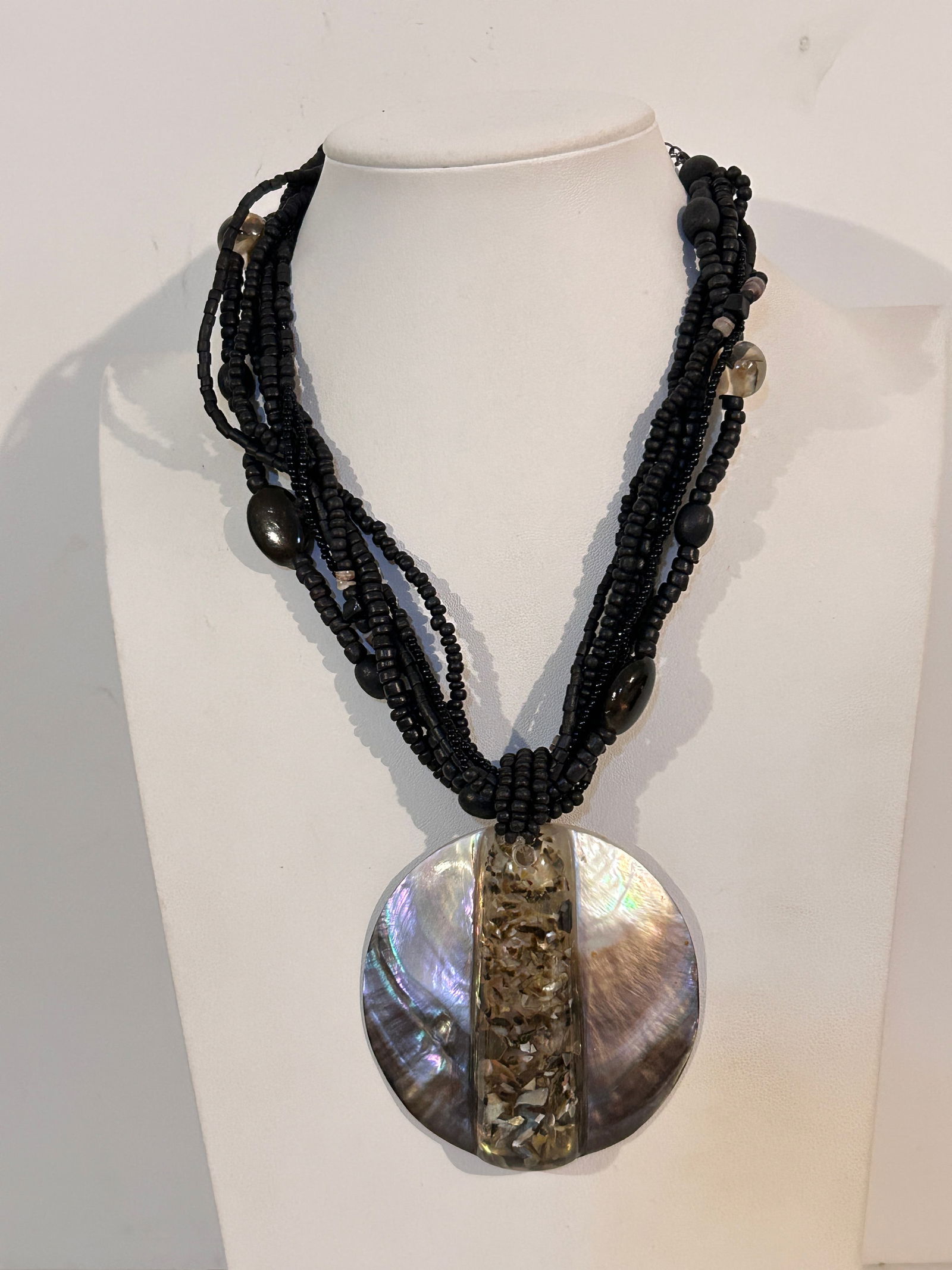 Vintage large Mother of pearl pendant beaded Necklace Sz 17": Vintage large Mother of pearl pendant beaded Necklace Sz 17" Please view all photos as they are part of the description and condition of this Item, Feel free to contact me with questions or picture re